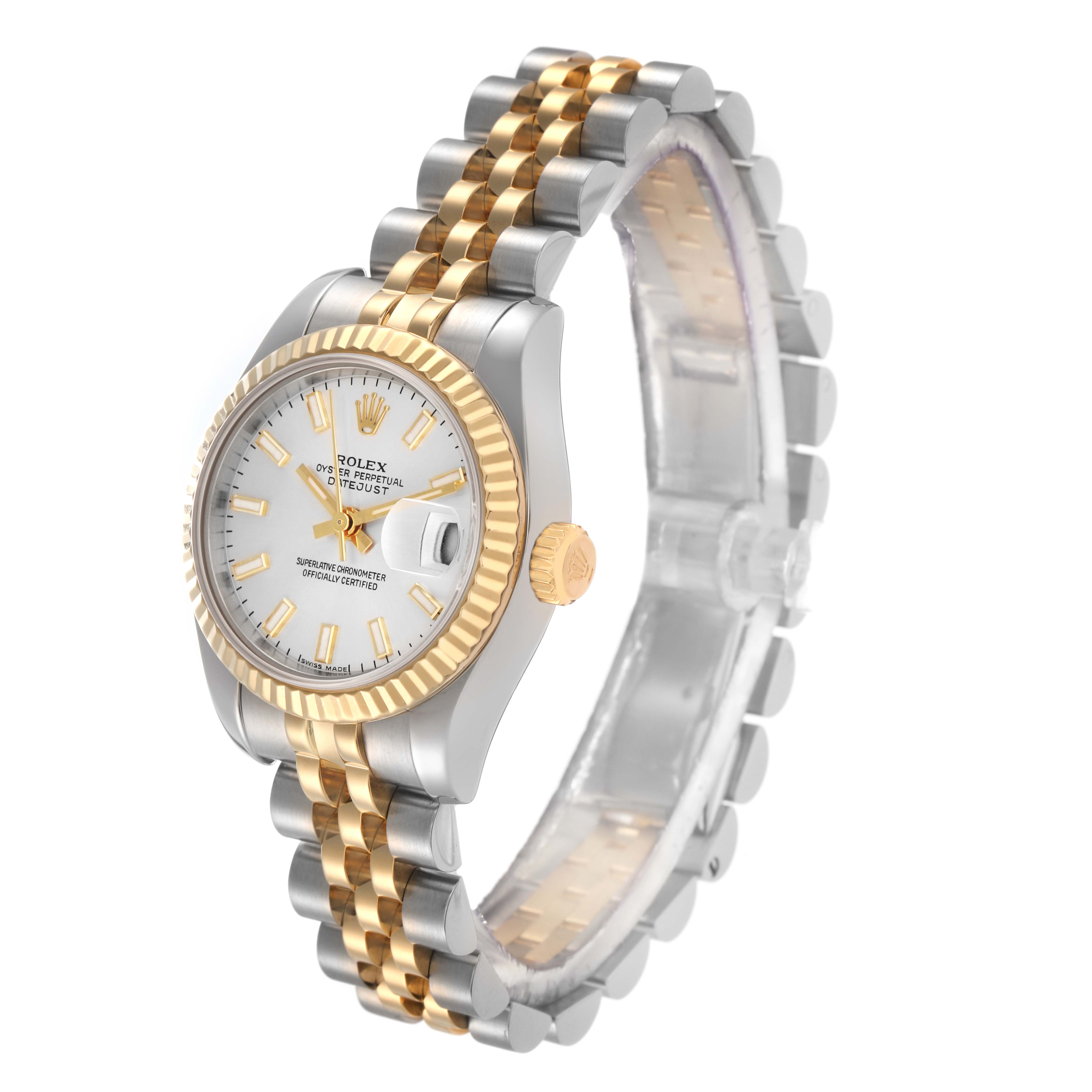 The Rolex Datejust model 179173 is shown at a three-quarter angle, highlighting its two-tone bracelet, fluted bezel, and dial with gold accents.