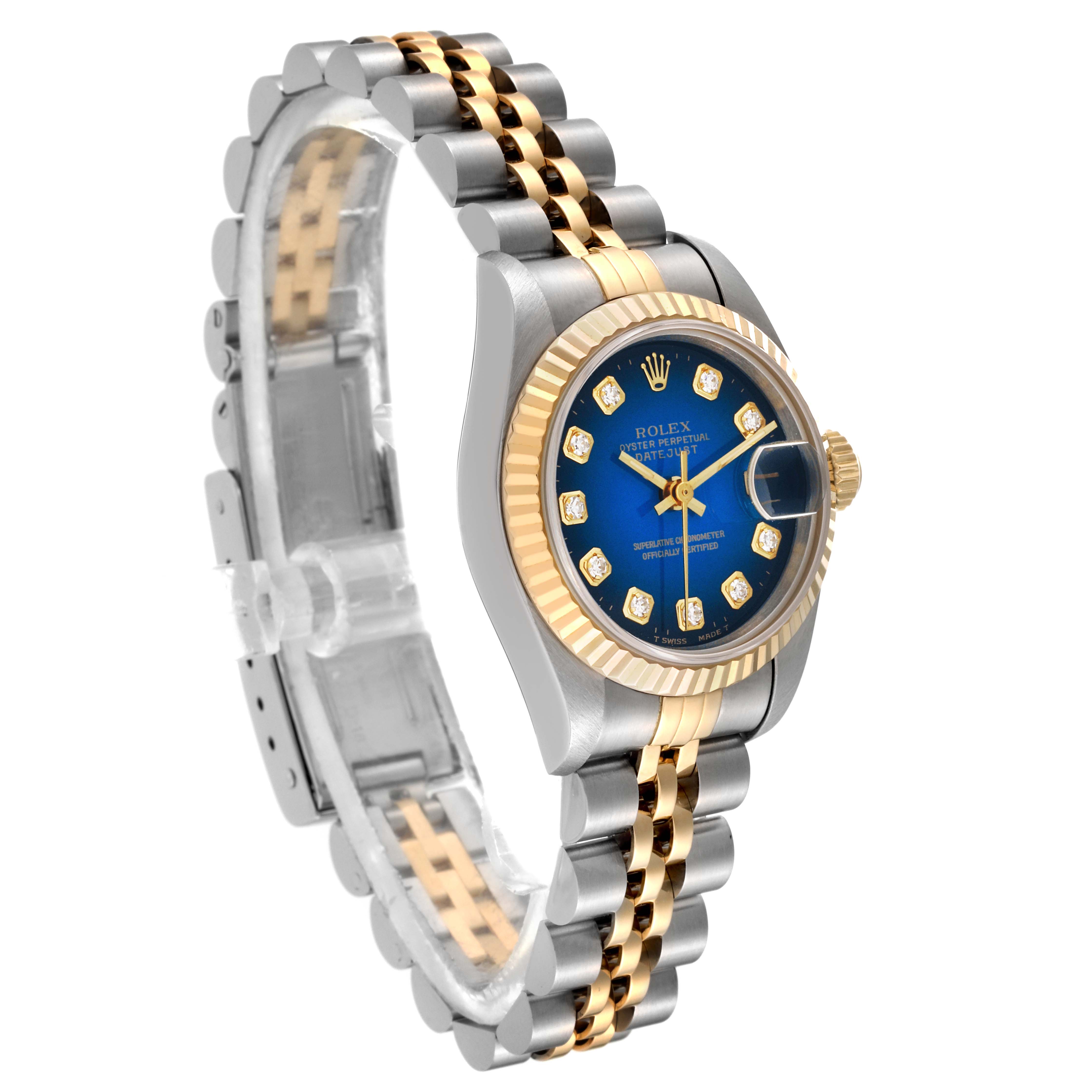 The image shows a side angle of the Rolex Datejust 69173 Women's Steel and Gold (two tone) Blue Dial 69173 Women's Steel and Gold (two tone) Blue Dial watch, highlighting its blue dial, two-tone bracelet, and fluted bezel.