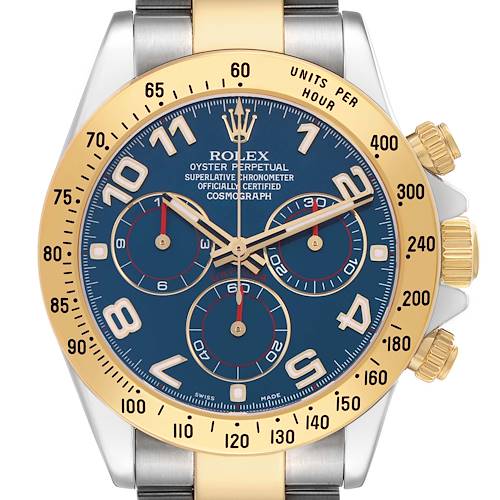 This image shows the face of a Rolex Daytona 116523 Men's Steel and Gold (two tone) Blue Dial watch, highlighting its blue dial, gold bezel, and sub-dials from a front view.