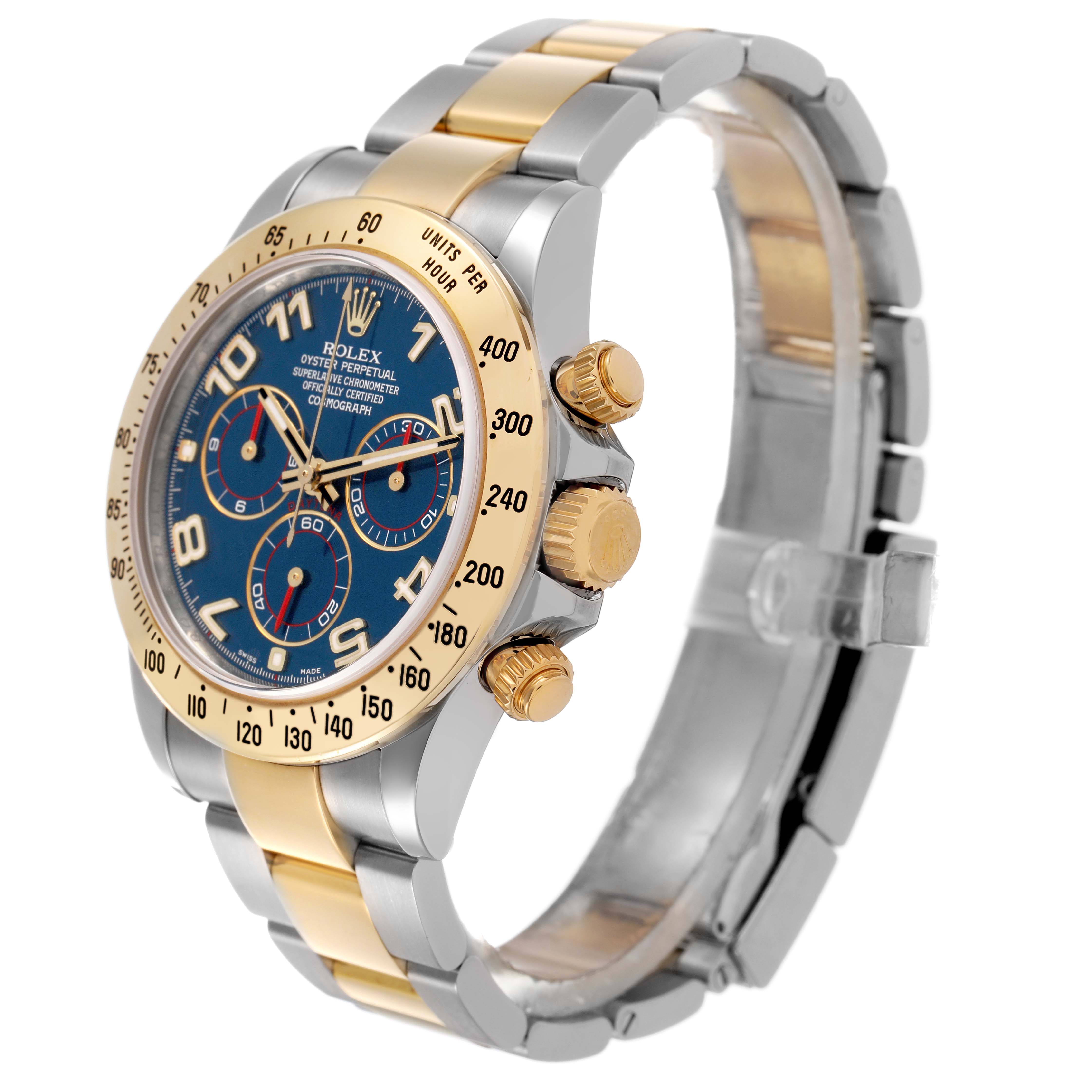 The Rolex Daytona 116523 Men's Steel and Gold (two tone) Blue Dial watch is shown at a slight angle, highlighting its face, bezel, and part of the bracelet.