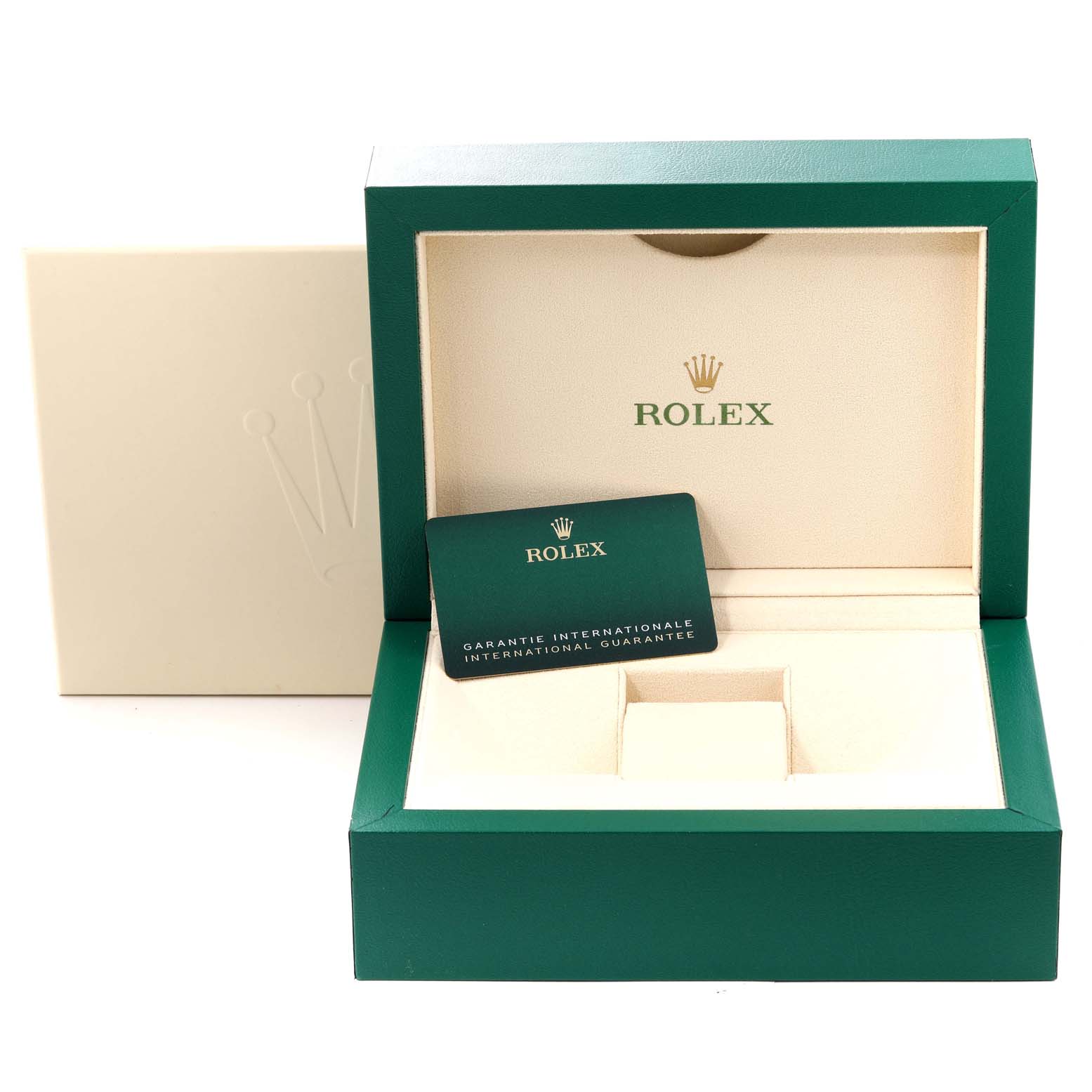 This image shows an open green Rolex box for the Daytona model with an international guarantee card placed inside.