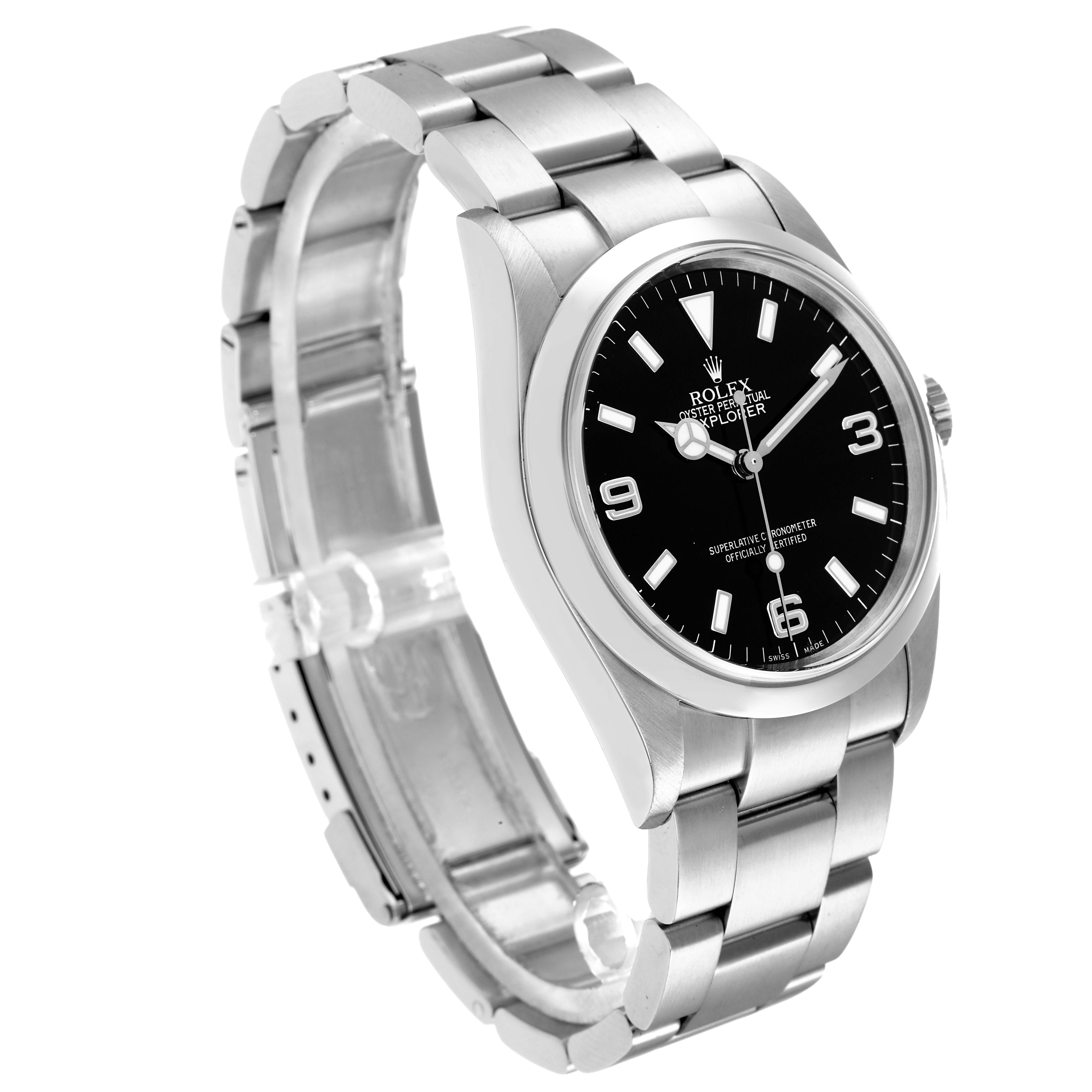 The Rolex Explorer model 114270 is shown at an angled side view, displaying its black dial, stainless steel case, and bracelet prominently.