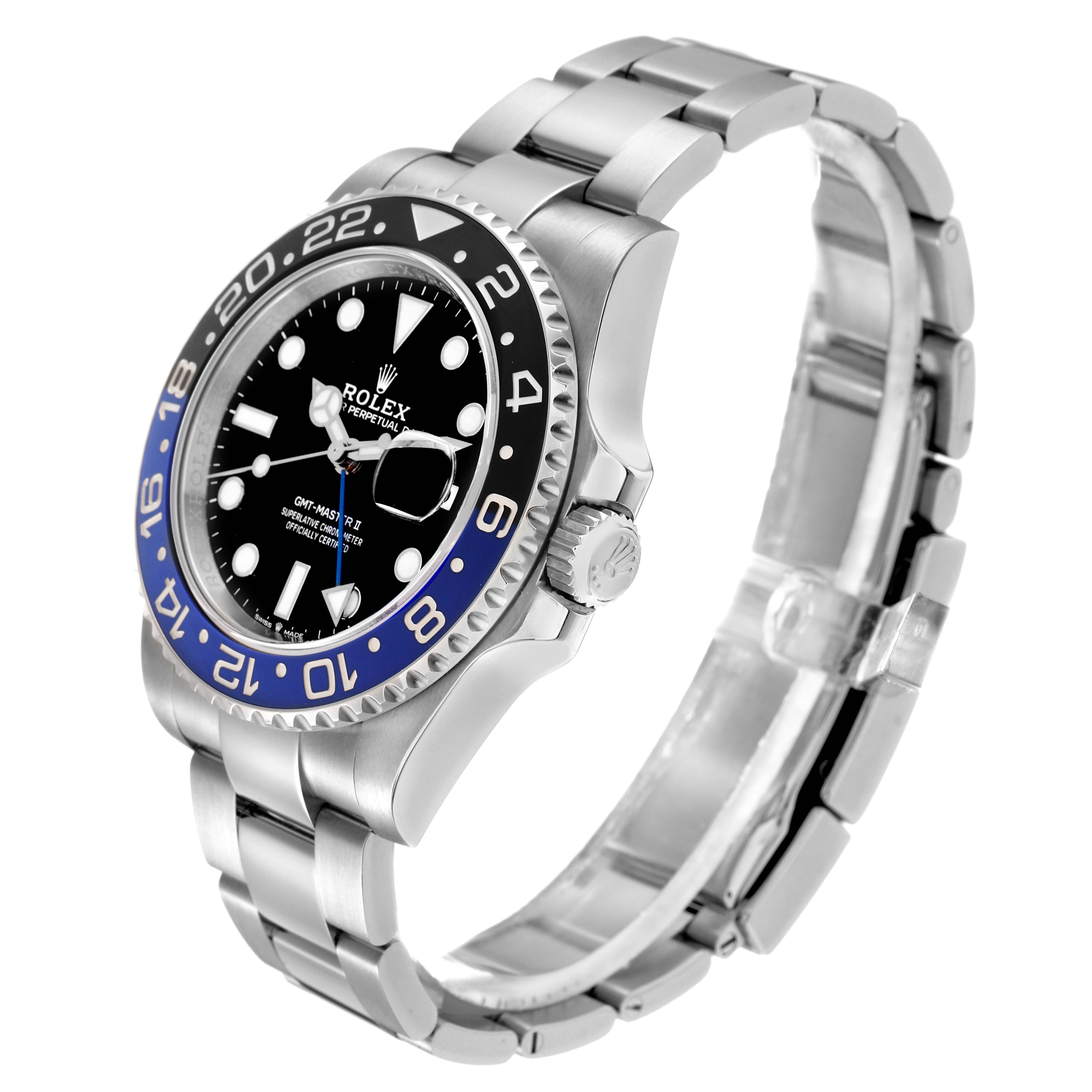 The Rolex GMT-Master model 126710 is shown at a three-quarter angle, highlighting its bezel, crown, bracelet, and dial features.