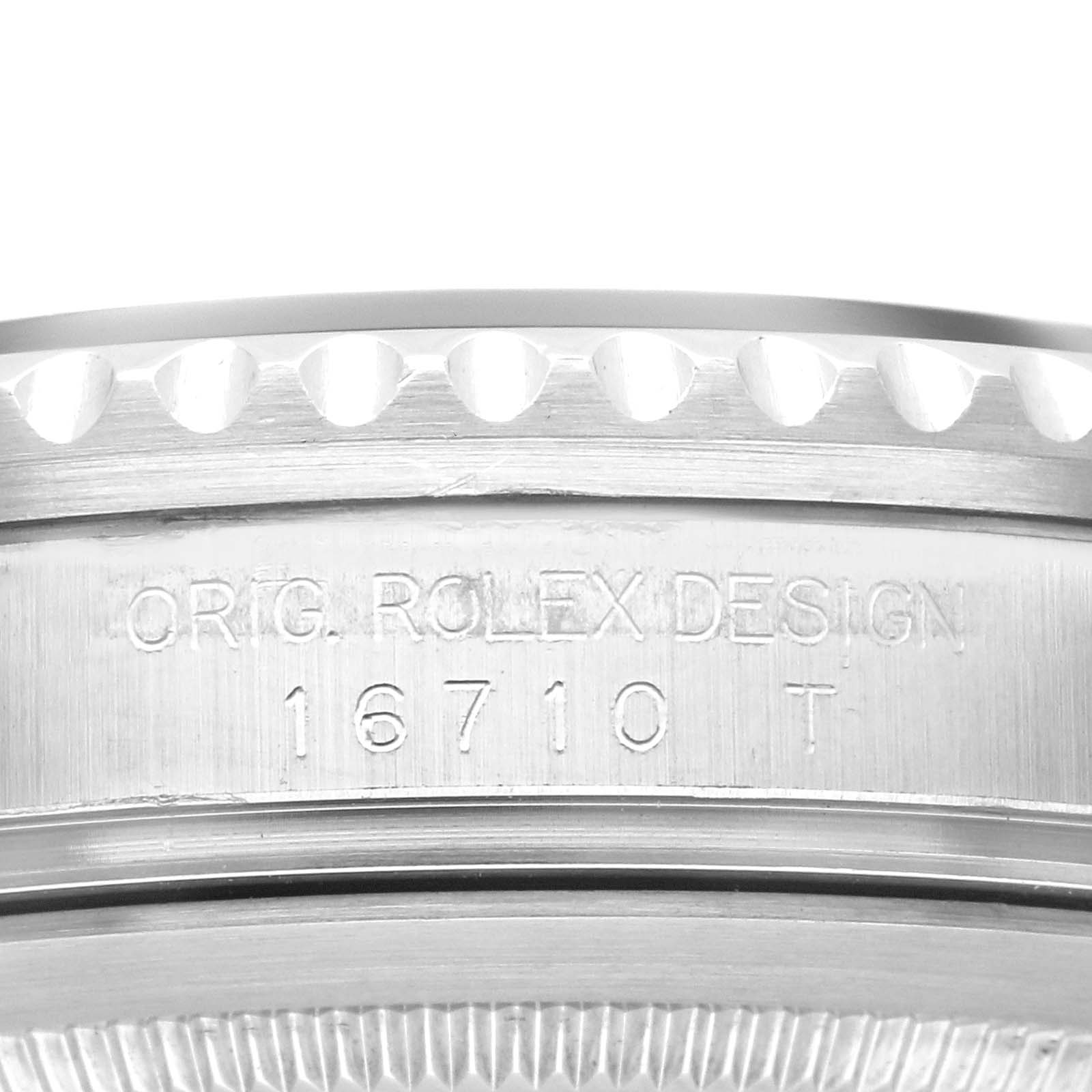 The image shows a close-up of the side of a Rolex GMT-Master 16710 Men's Stainless Steel Black Dial 16710 Men's Stainless Steel Black Dial watch, highlighting the model number 16710.