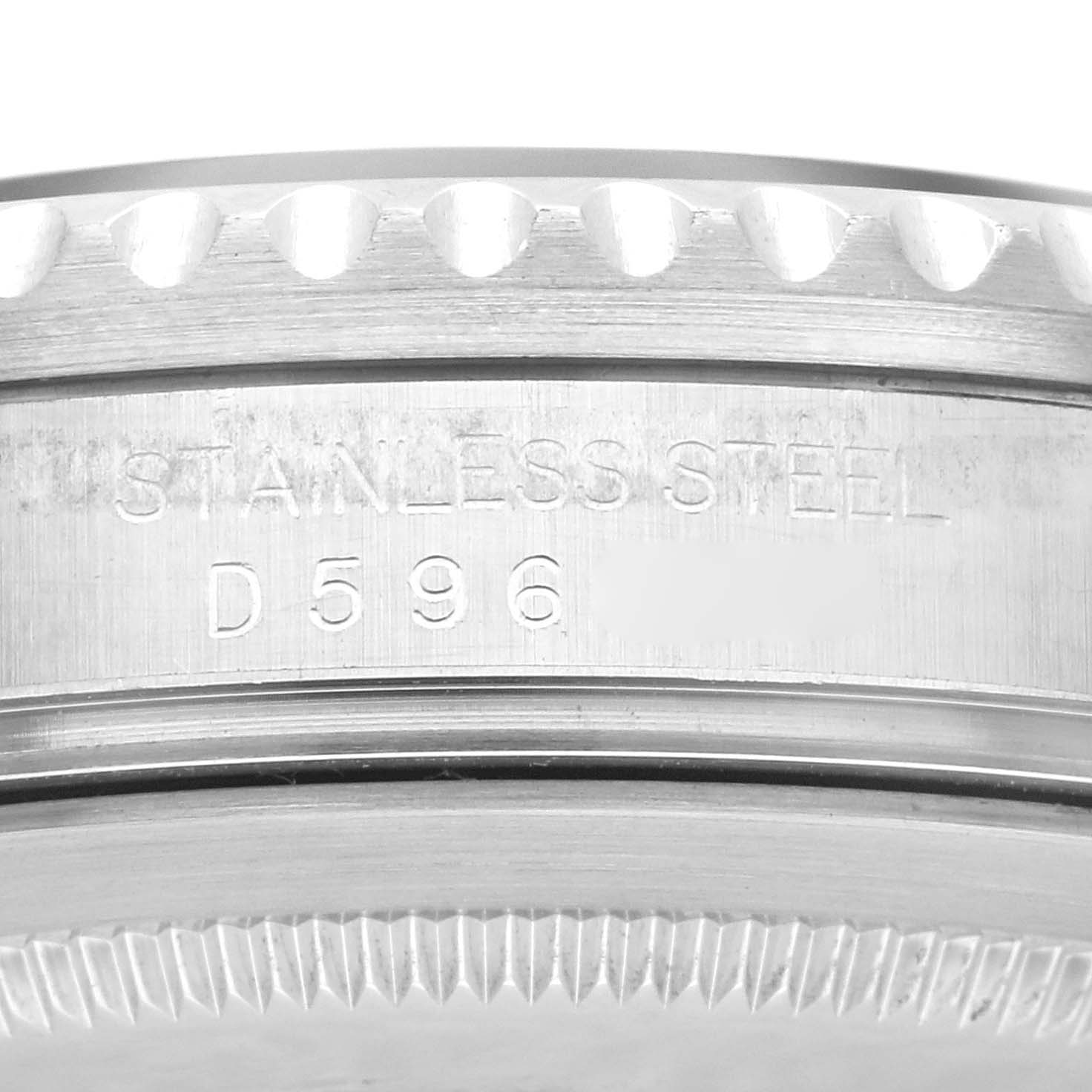 The image shows a close-up angle of the case side of a Rolex GMT-Master 16710 Men's Stainless Steel Black Dial 16710 Men's Stainless Steel Black Dial, displaying the stainless steel engravings and serial number.