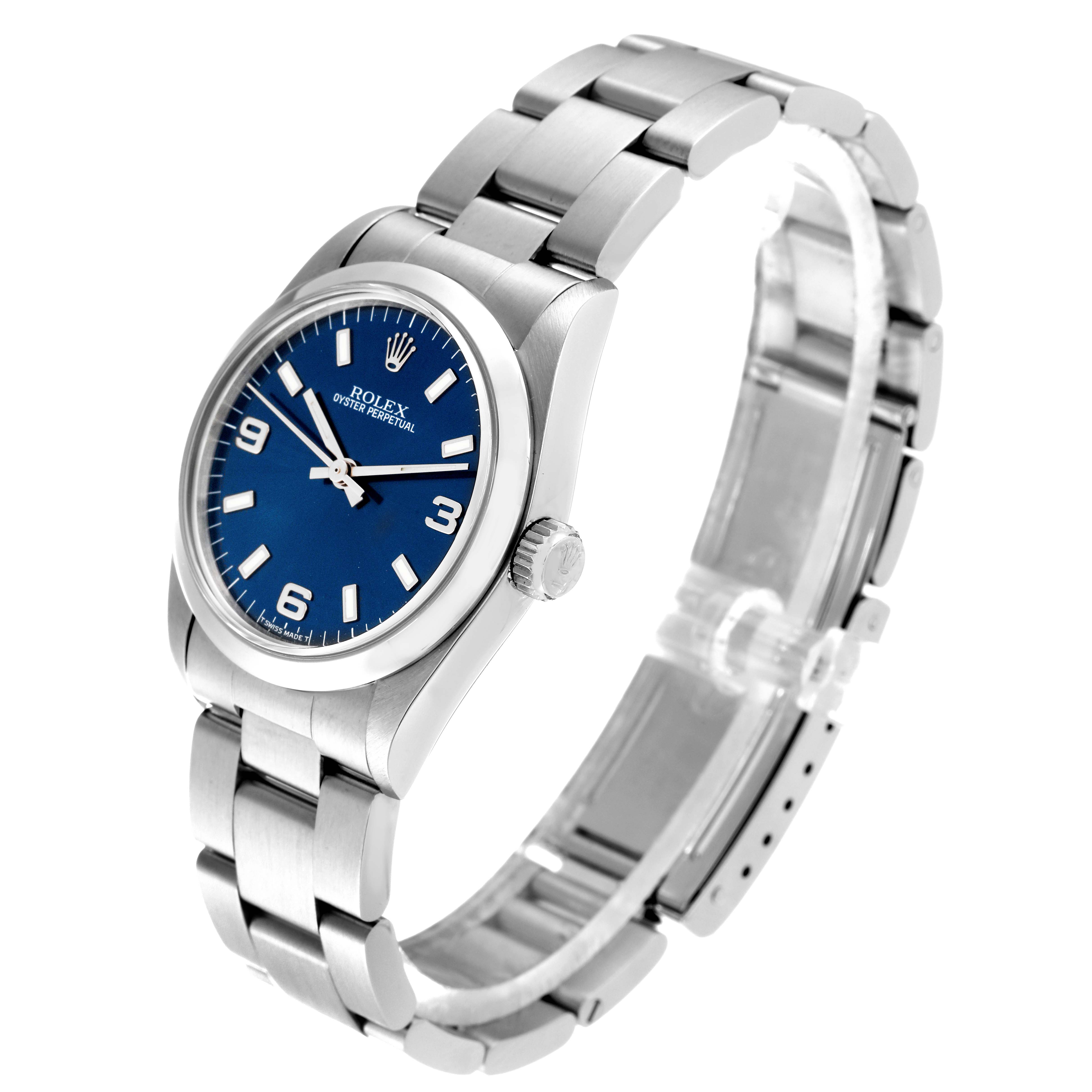 The angle shows the front and side of the Rolex Mid-Size 67480 Women's Stainless Steel Blue Dial 67480 Women's Stainless Steel Blue Dial Oyster Perpetual watch, including its bracelet and crown.