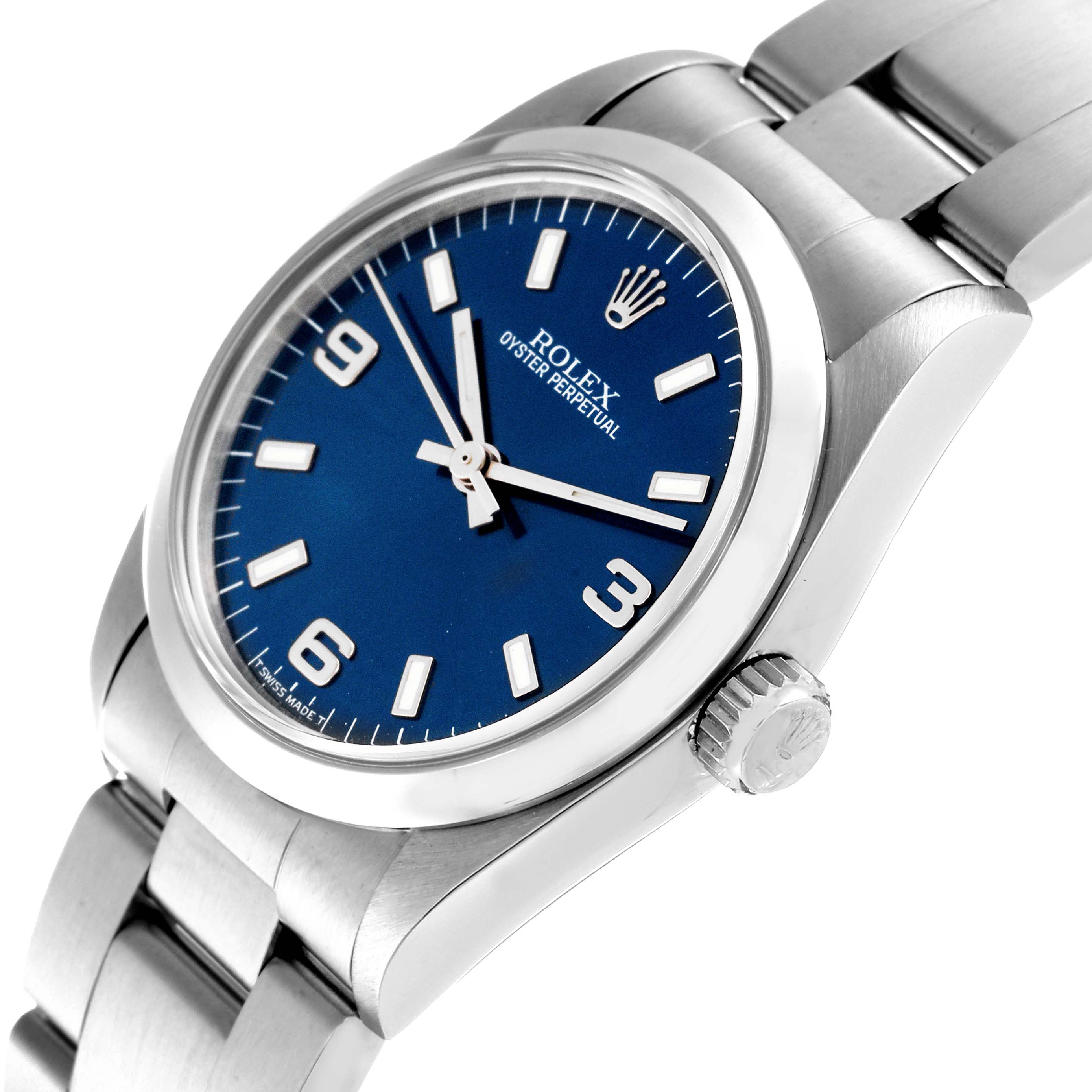 This image shows a Rolex Oyster Perpetual Mid-Size watch angled slightly from the right, highlighting the blue dial, crown, and stainless steel bracelet.