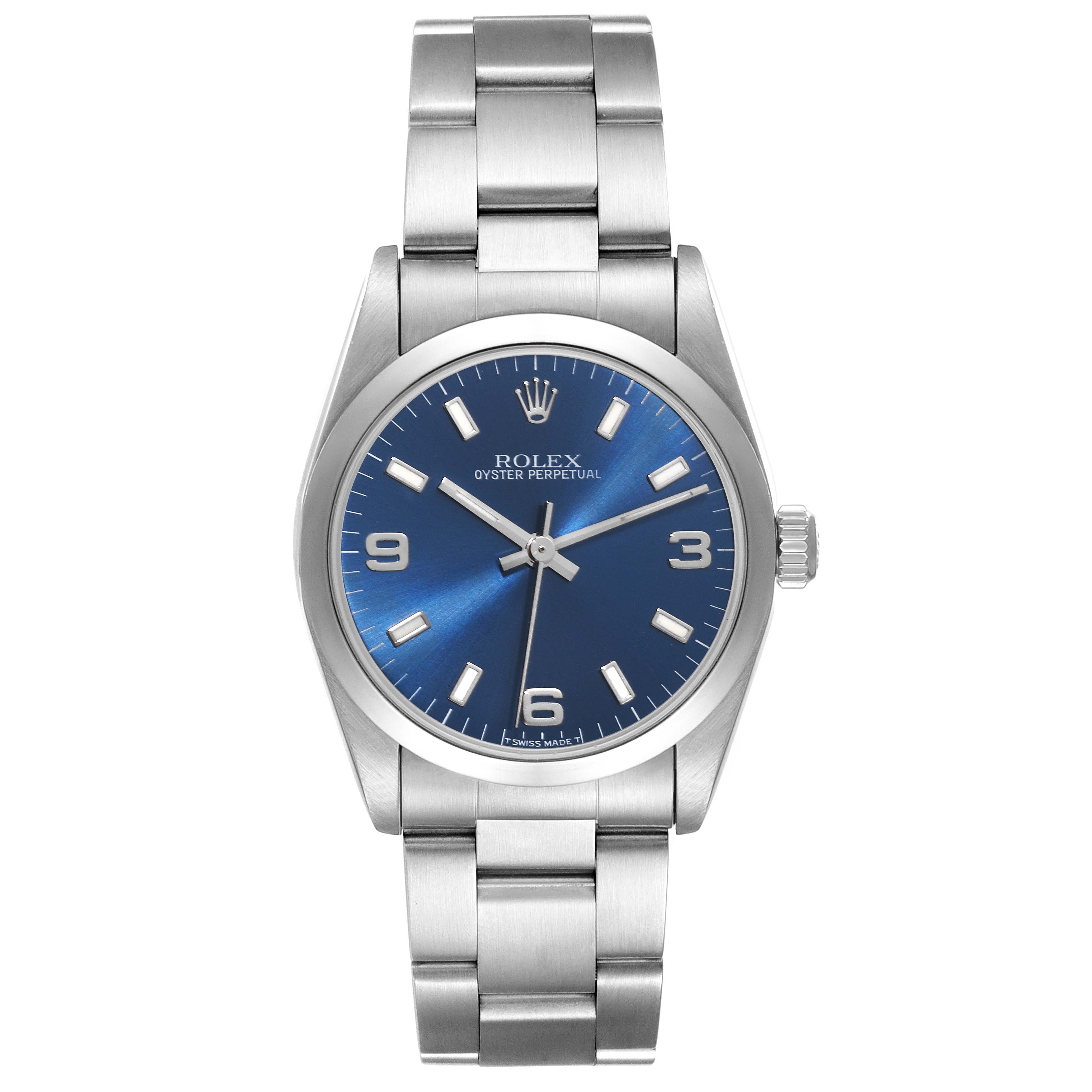 The image shows a front view of a Rolex Oyster Perpetual Mid-Size watch, displaying its blue dial, silver bracelet, and case.