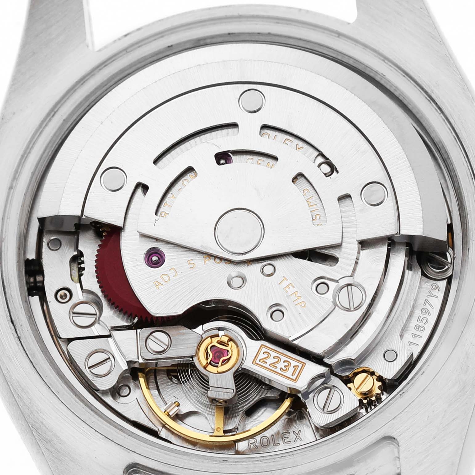The image shows the movement of a Rolex Oyster Perpetual 176200 Women's Stainless Steel Black Dial, focusing on its intricate mechanical components from the back.