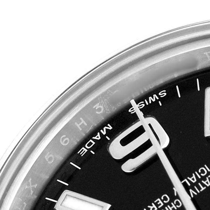 The image shows a close-up of the Rolex Oyster Perpetual 176200 Women's Stainless Steel Black Dial watch dial, focusing on the numerals, hands, and markings.