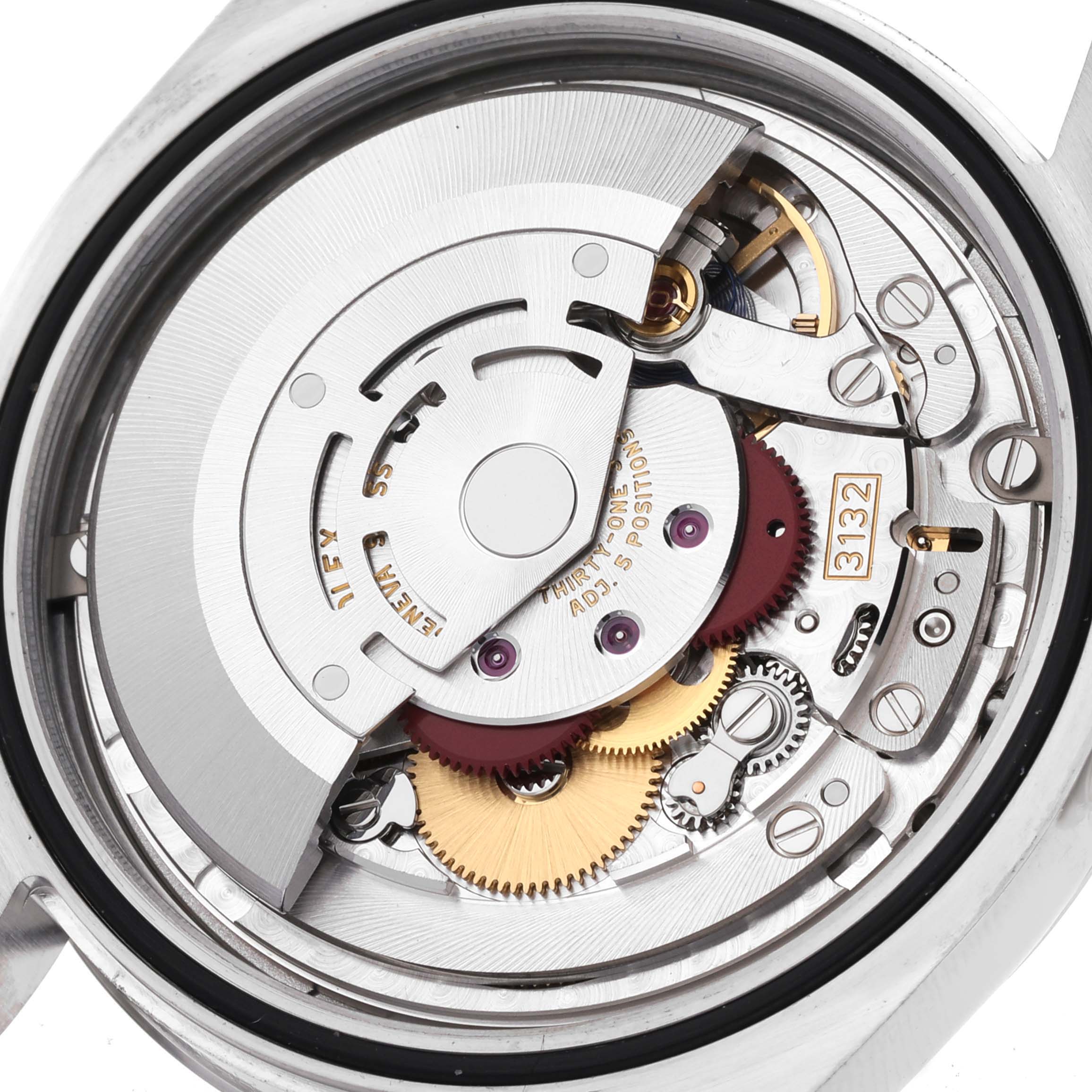 This image shows a close-up of the movement mechanism inside a Rolex Oyster Perpetual 114300 Men
s Stainless Steel Blue Dial 114300 Men
s Stainless Steel Blue Dial watch.