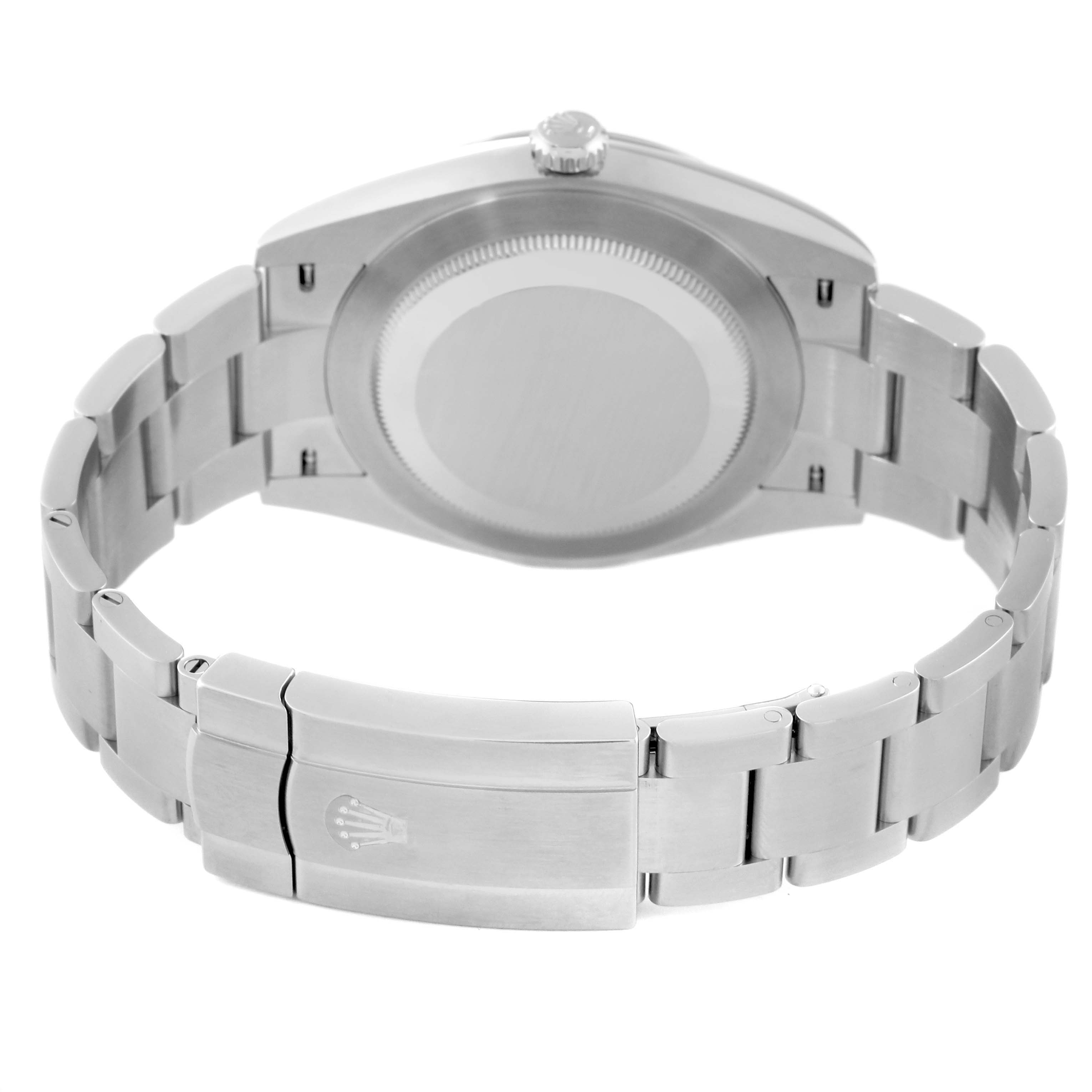 The image shows the back and bracelet of a Rolex Oyster Perpetual 124300 Men's Stainless Steel Green Dial 124300 Men's Stainless Steel Green Dial watch at a tilted angle.