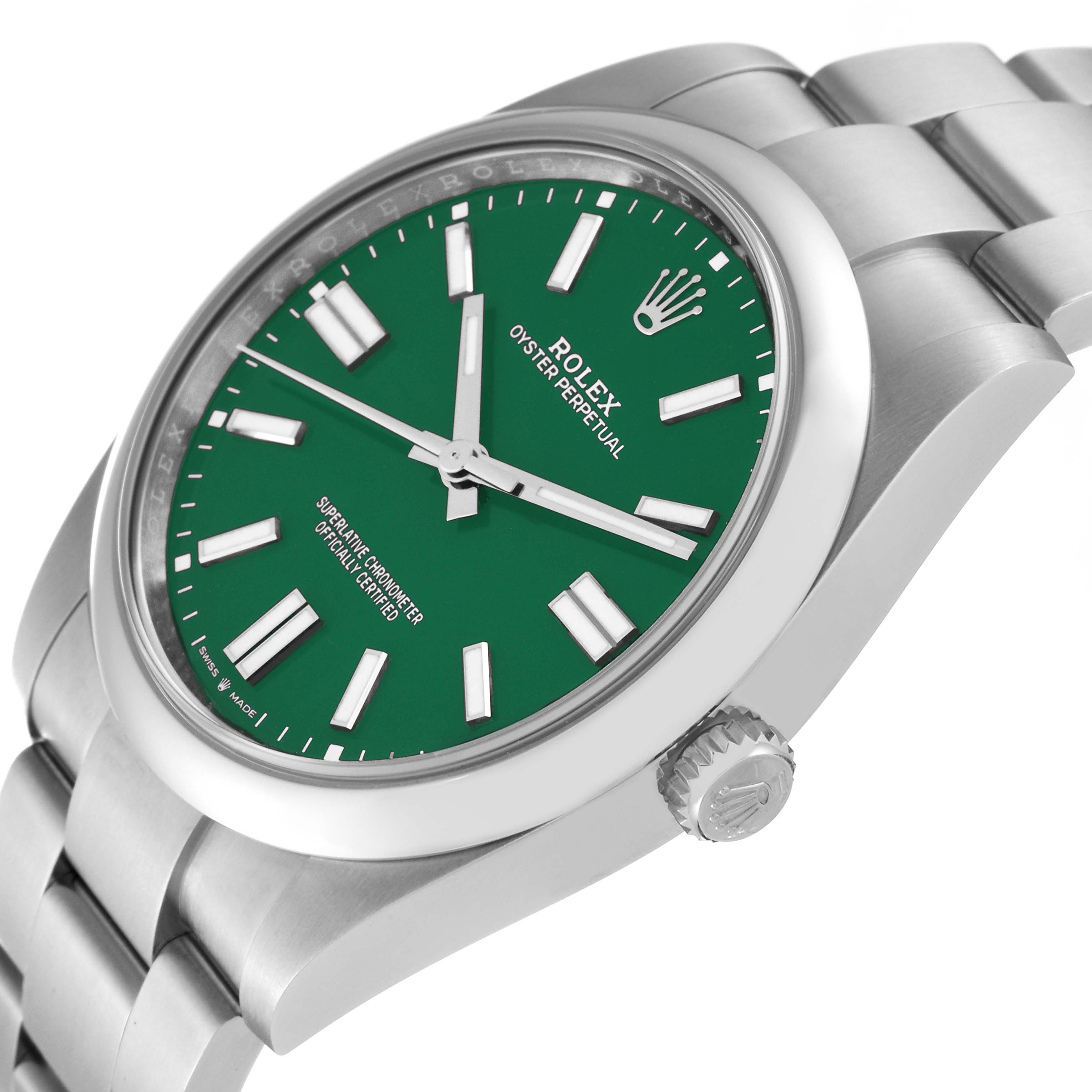 The image shows a side angle of the Rolex Oyster Perpetual 124300 Men's Stainless Steel Green Dial 124300 Men's Stainless Steel Green Dial watch, highlighting the green dial, crown, and stainless steel bracelet.