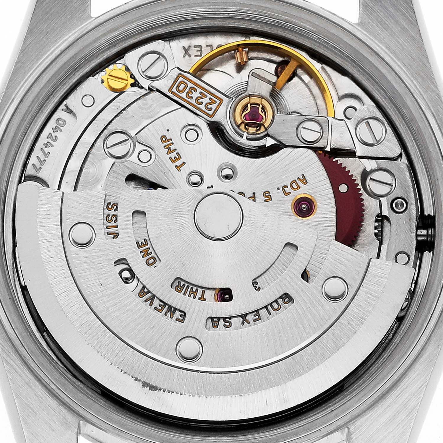 The image shows a close-up of the movement mechanism of a Rolex Oyster Perpetual 76080 Women's Stainless Steel Pink Dial 76080 Women's Stainless Steel Pink Dial watch from the back.