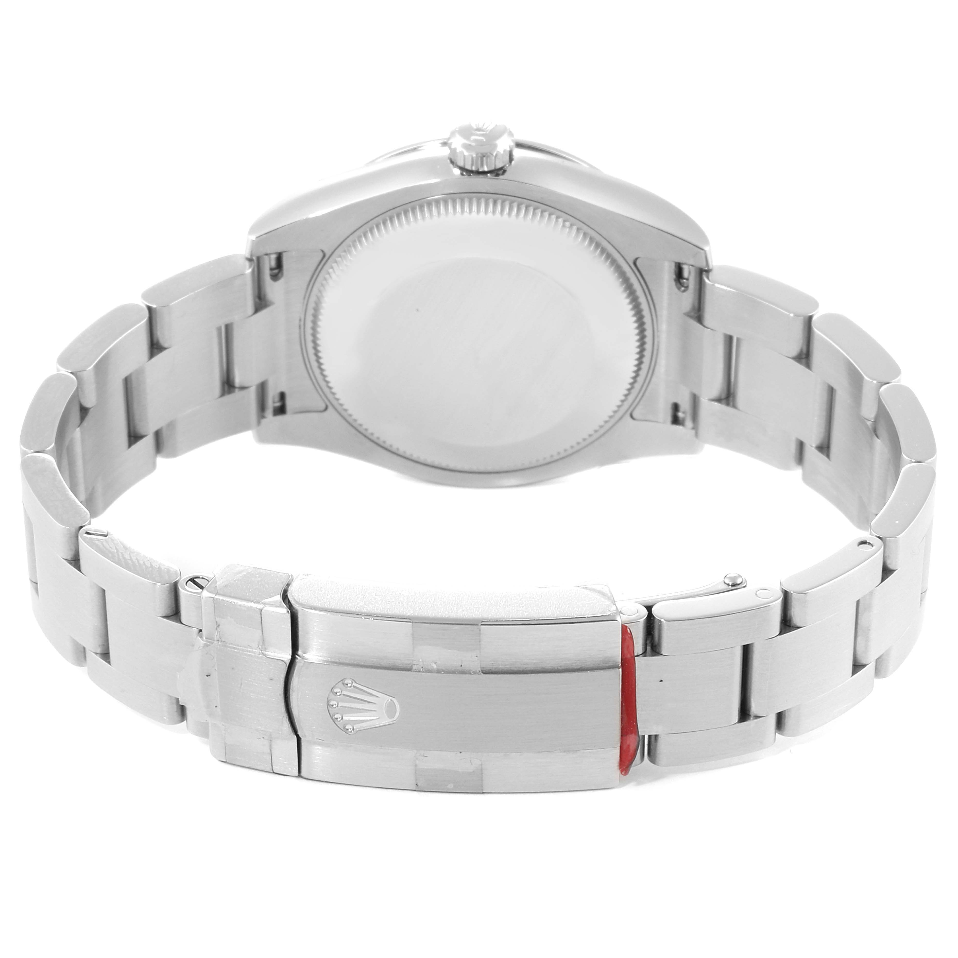 The image shows the back case and the bracelet clasp of a Rolex Mid-Size 177200 Women
s Stainless Steel Blue Dial 177200 Women
s Stainless Steel Blue Dial watch.