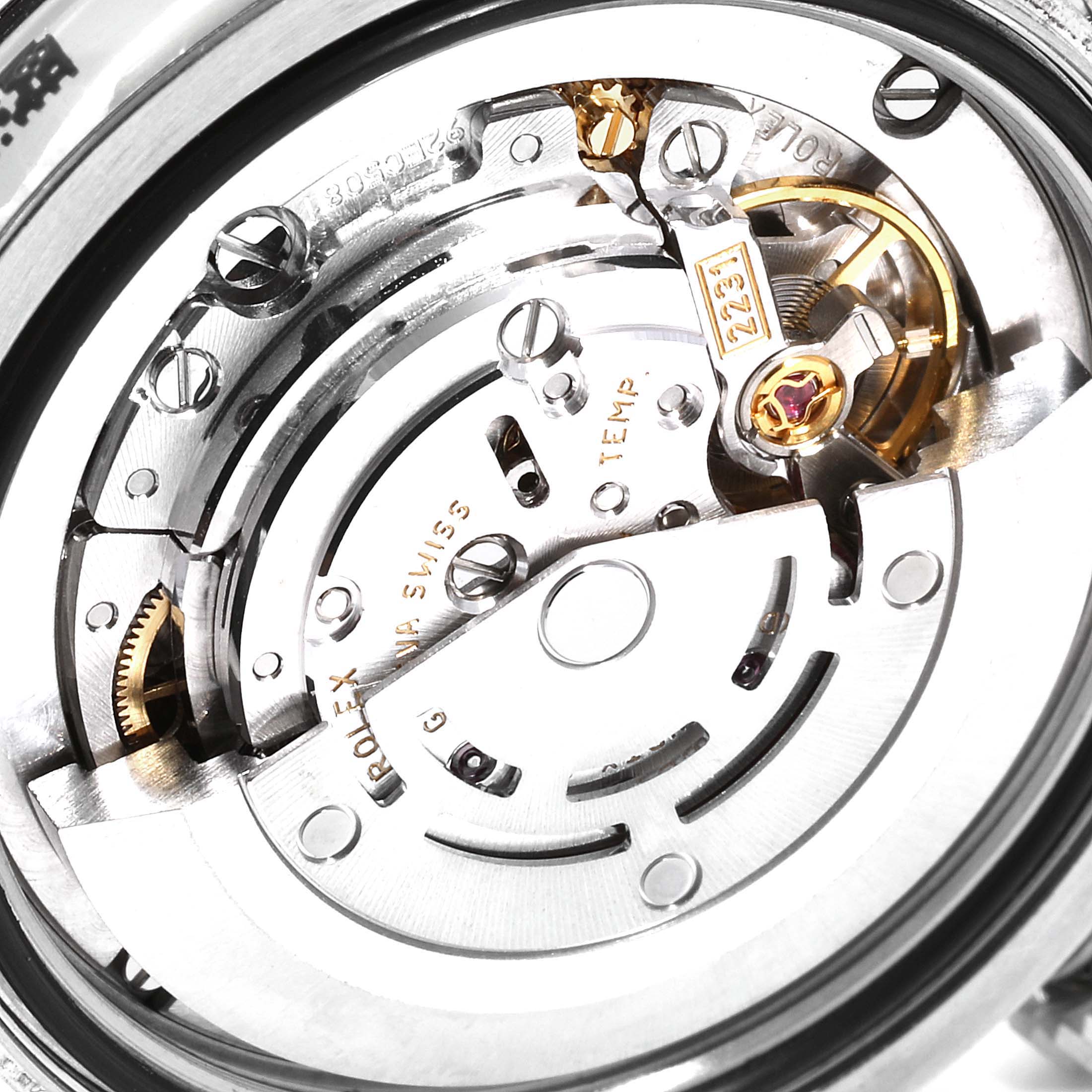 This image shows a close-up view of the movement mechanism of a Rolex Mid-Size 177200 Women
s Stainless Steel Blue Dial 177200 Women
s Stainless Steel Blue Dial watch.