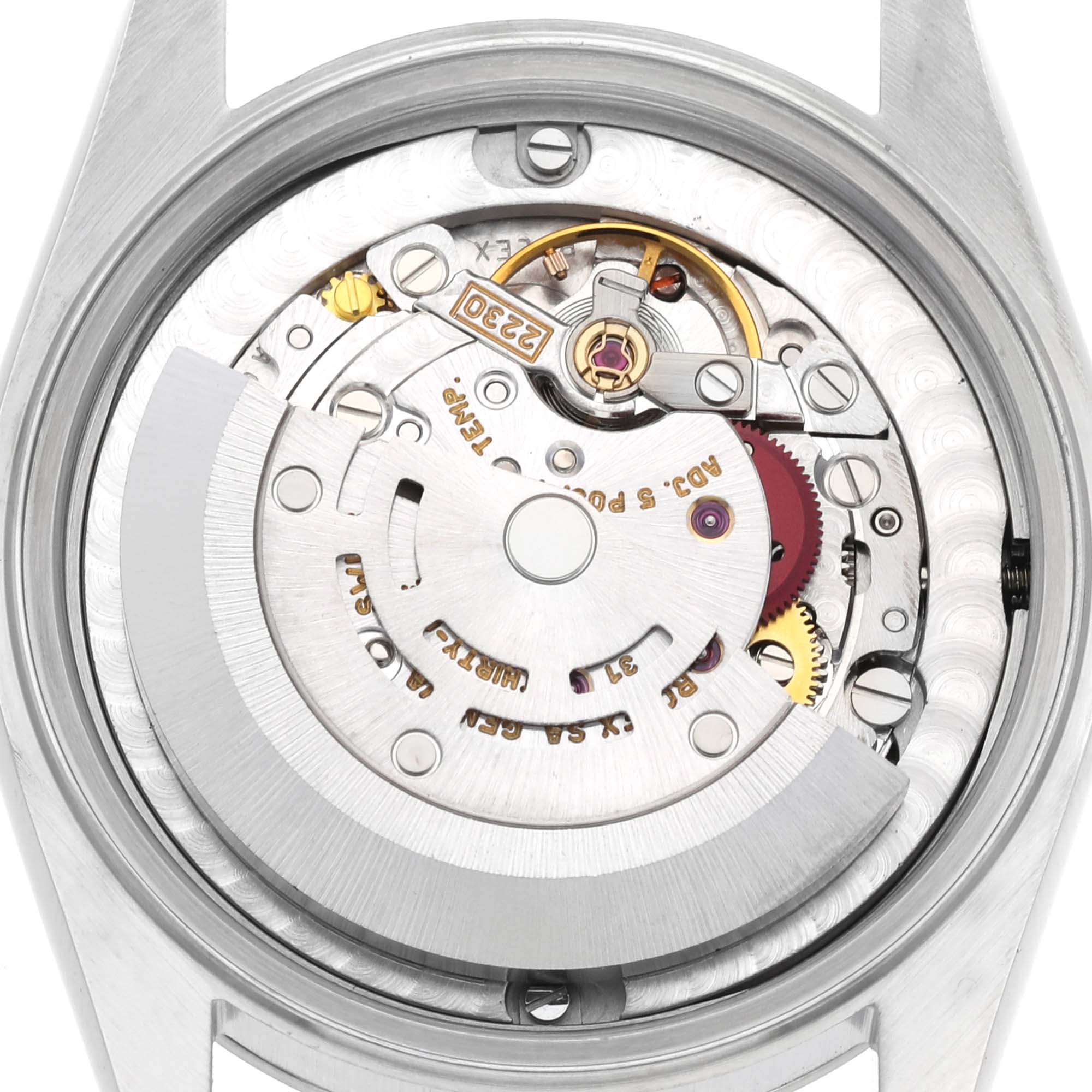 The image shows the internal mechanism of the Mid-Size Rolex watch viewed from the back case, highlighting the intricate watch movement components.