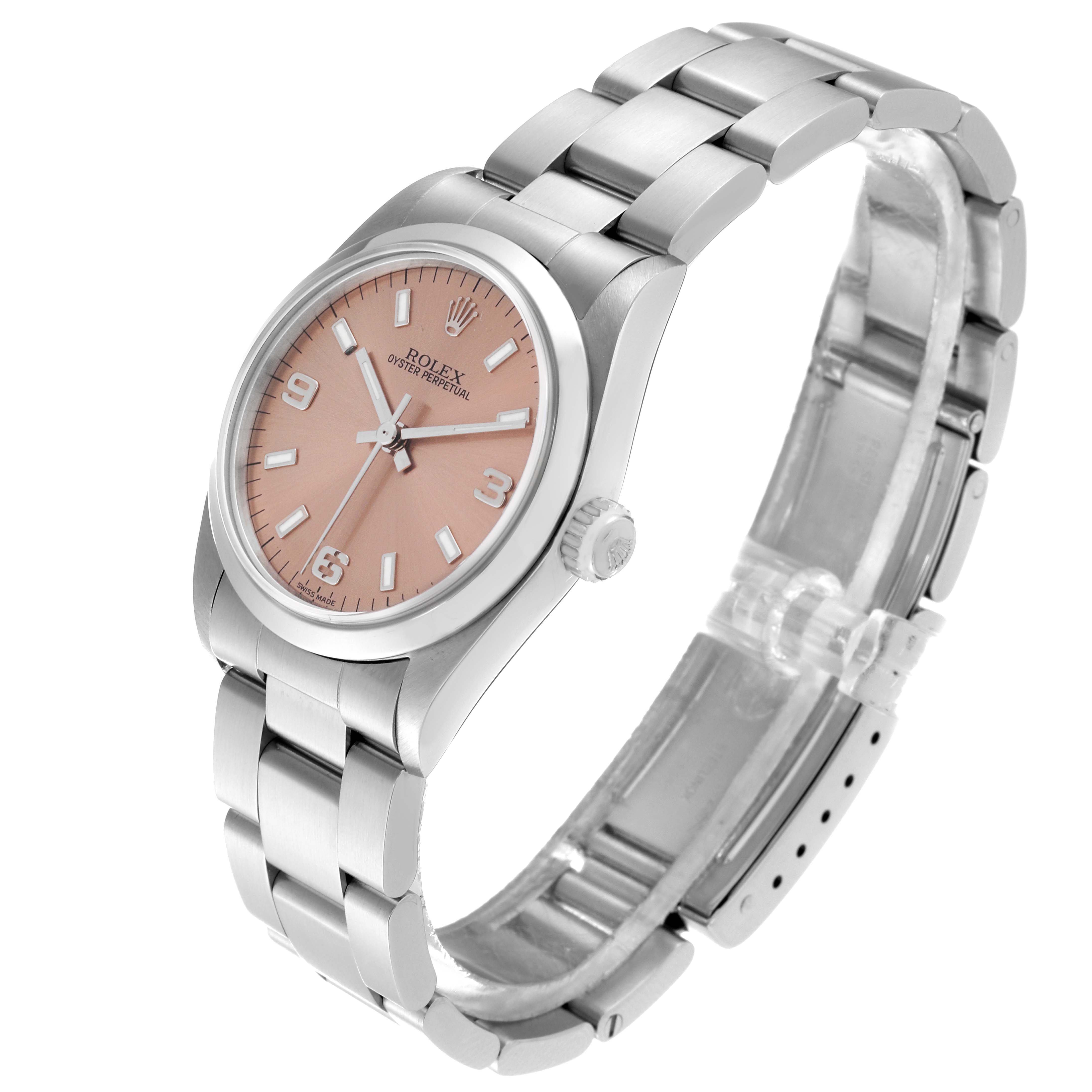 The image shows a side and front angle of a Rolex Mid-Size 77080 Women's Stainless Steel Pink Dial 77080 Women's Stainless Steel Pink Dial Oyster Perpetual watch, highlighting its dial, bracelet, and clasp.