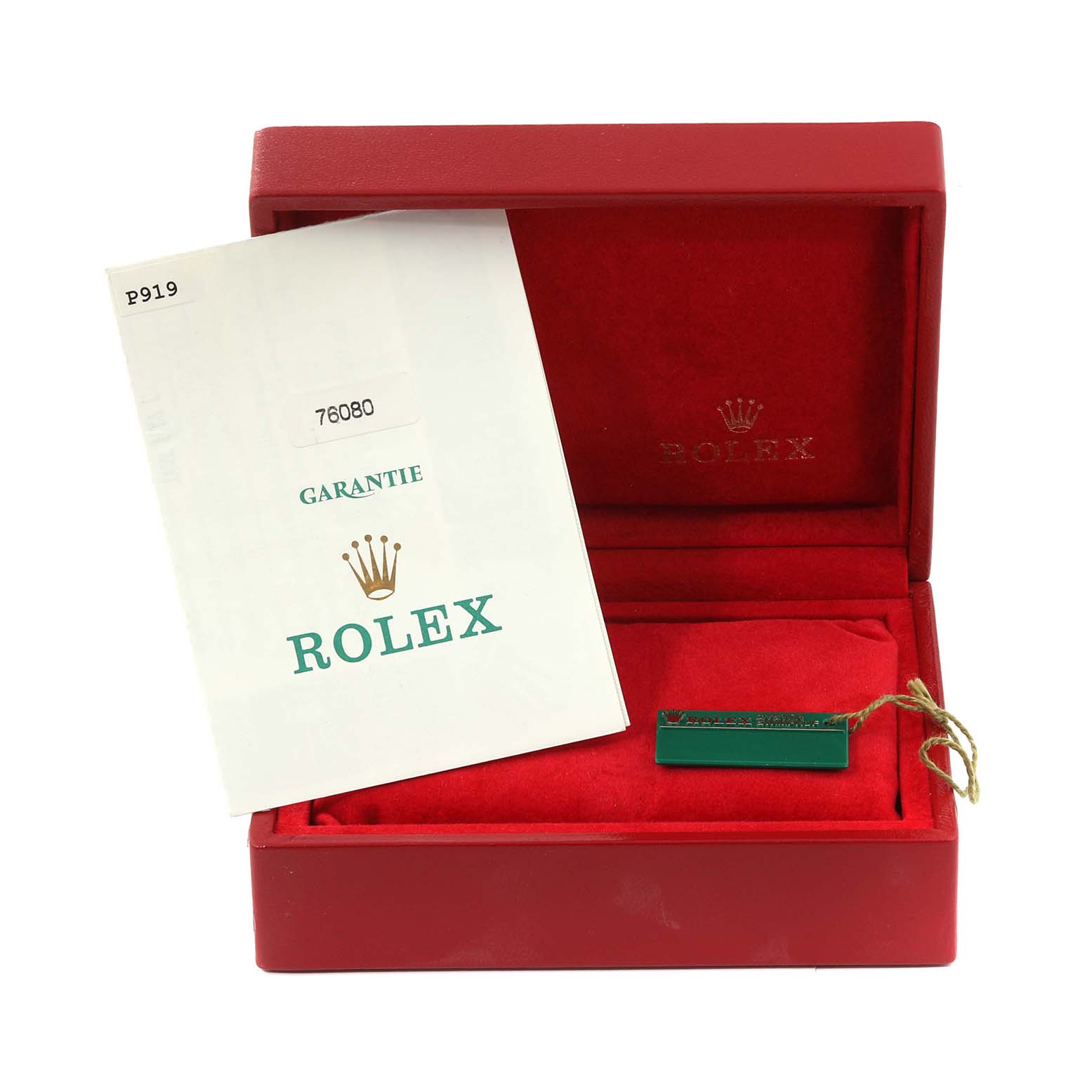 The image shows a red Rolex box with a Garantie booklet and tag for the Oyster Perpetual model.