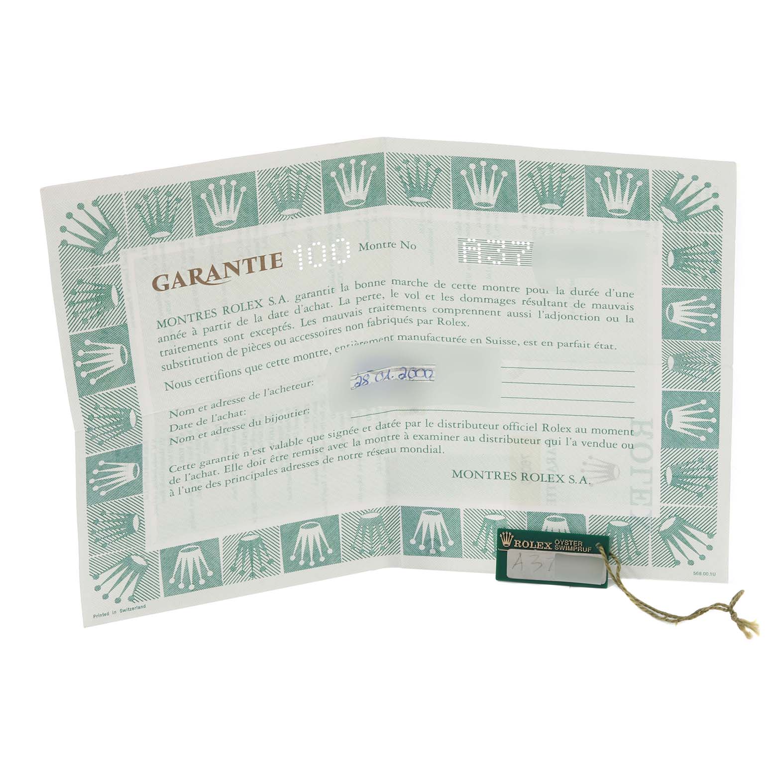 This image shows the warranty card and tag for a Rolex Oyster Perpetual 76080 Women's Stainless Steel Blue Dial 76080 Women's Stainless Steel Blue Dial watch.