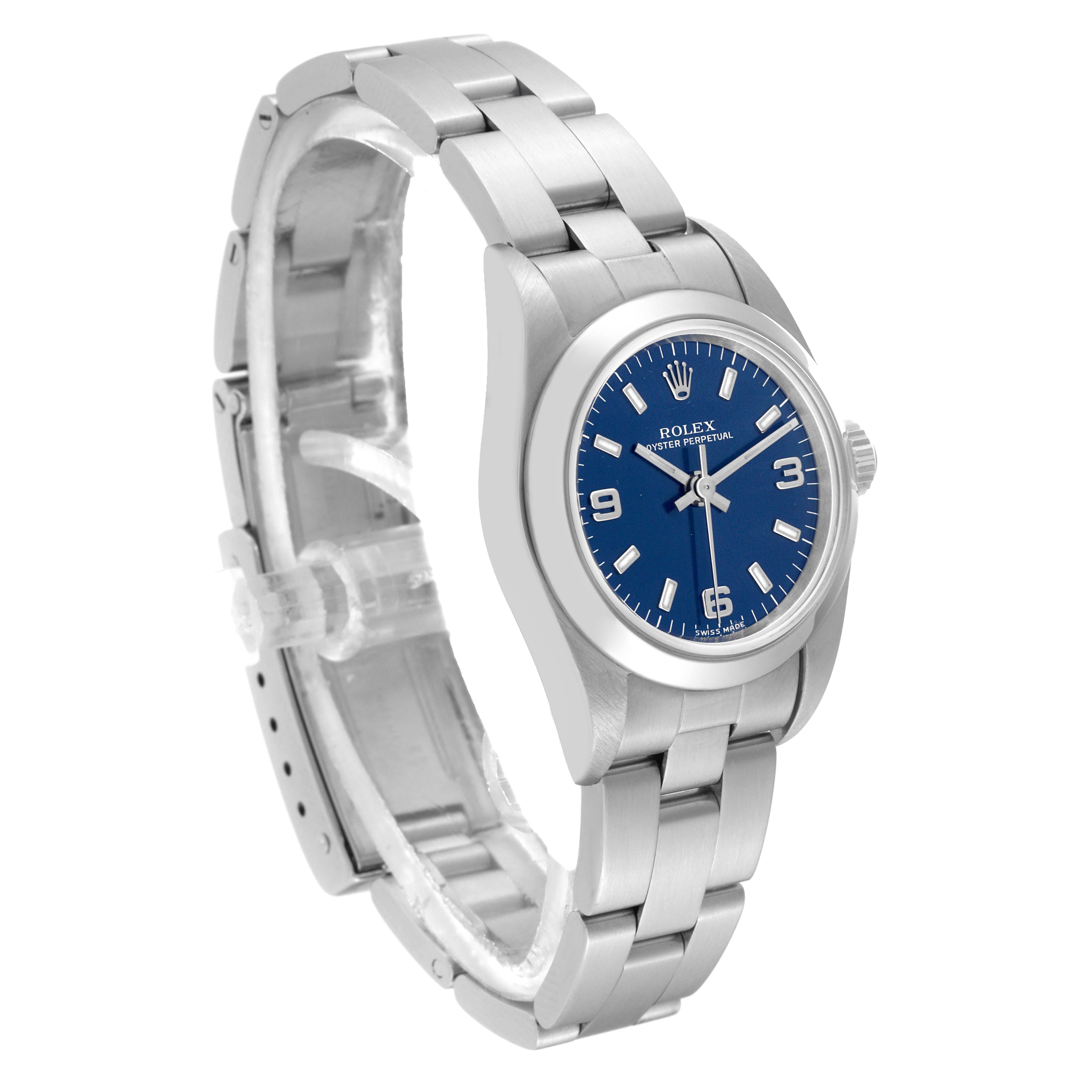 The Rolex Oyster Perpetual 76080 Women's Stainless Steel Blue Dial 76080 Women's Stainless Steel Blue Dial watch is shown at a slight angle, highlighting the blue dial, stainless steel case, and bracelet.