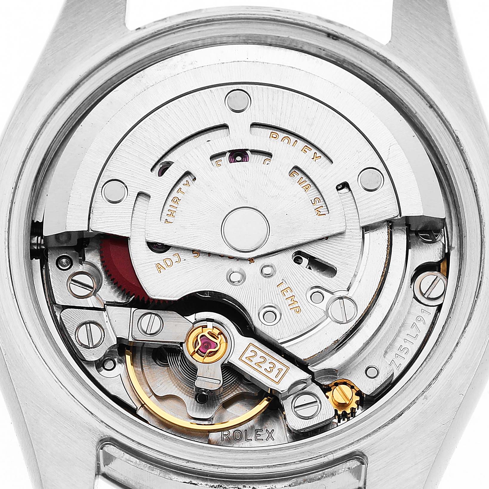 The image shows the internal mechanism of the Rolex Oyster Perpetual 176200 Women's Stainless Steel Green Dial watch from a back view, revealing its intricate components.