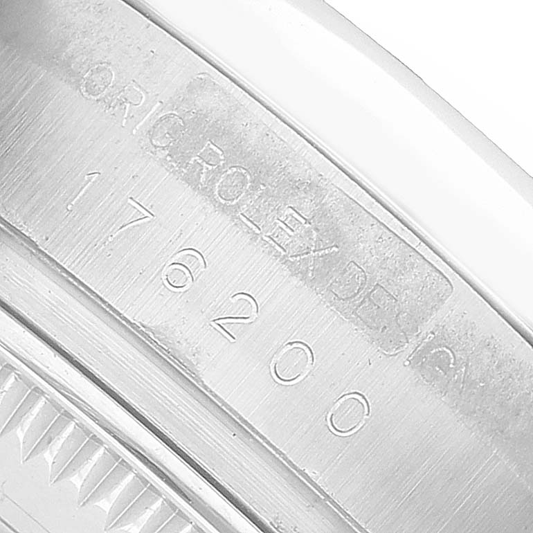 The image shows a close-up of the engraved model number on the Rolex Oyster Perpetual 176200 Women's Stainless Steel Green Dial watch casing.
