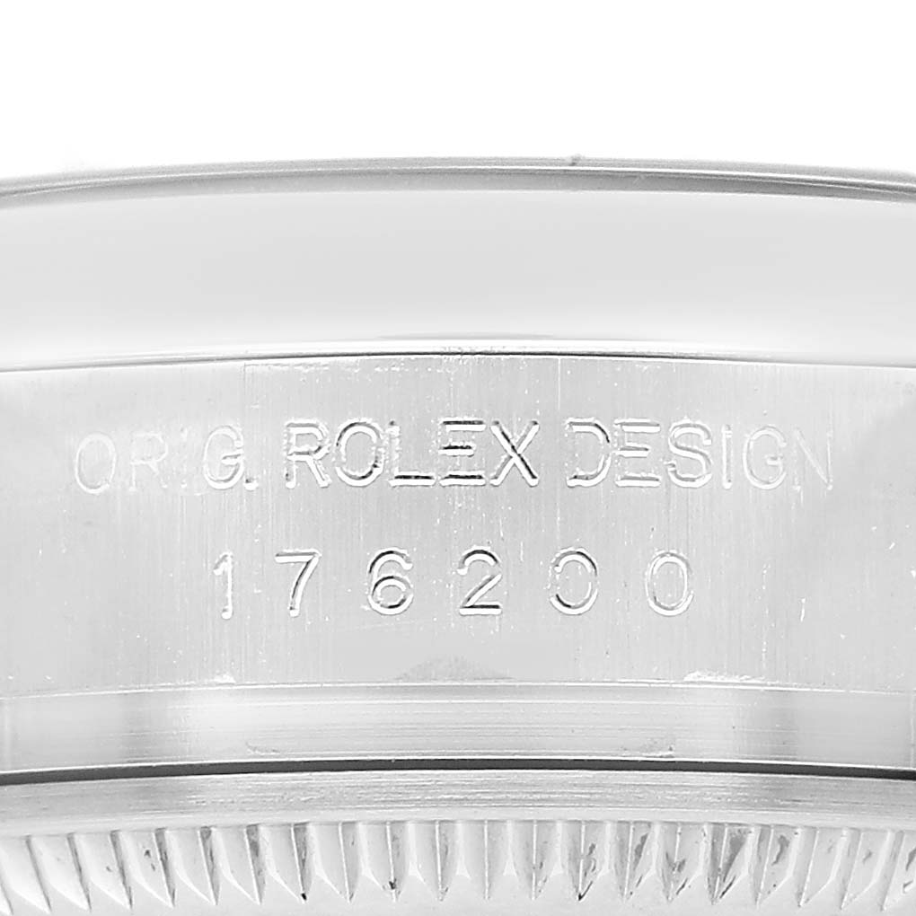 The image shows the side view of the Rolex Oyster Perpetual 176200 Women's Stainless Steel White Dial watch case with the model number engraving.
