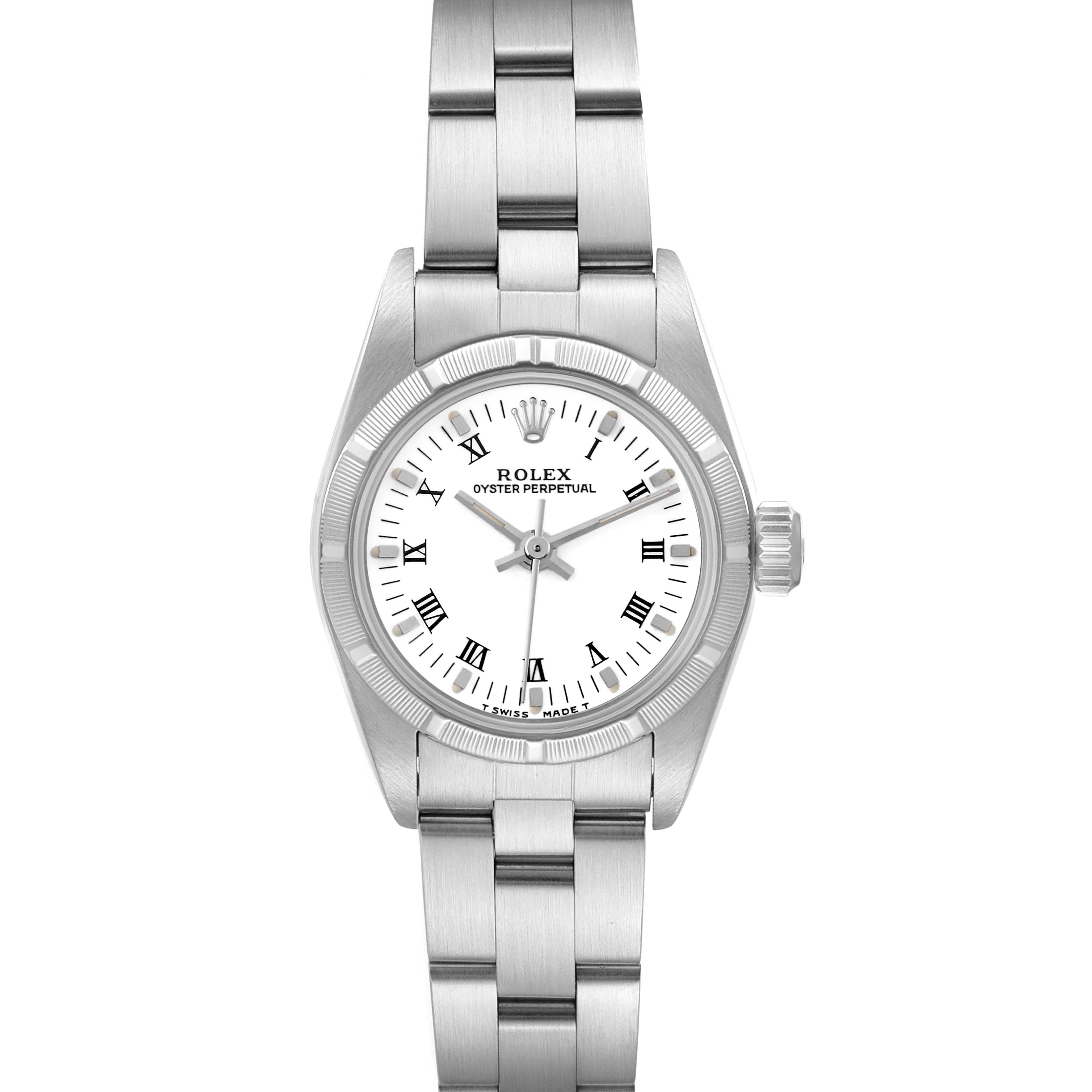 The Rolex Oyster Perpetual 67230 Women's Stainless Steel White Dial 67230 Women's Stainless Steel White Dial watch is shown from a top-down angle, highlighting its face, crown, and bracelet.