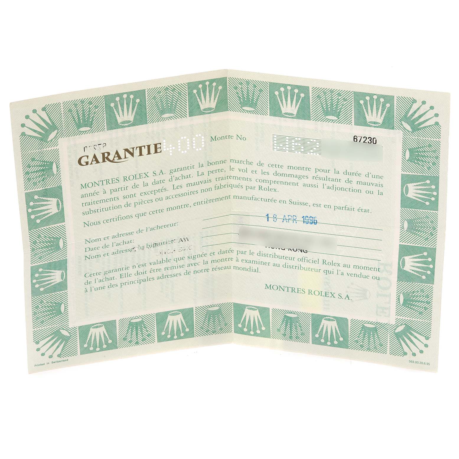 This is the warranty certificate for the Rolex Oyster Perpetual 67230 Women's Stainless Steel White Dial 67230 Women's Stainless Steel White Dial model, displayed fully open.