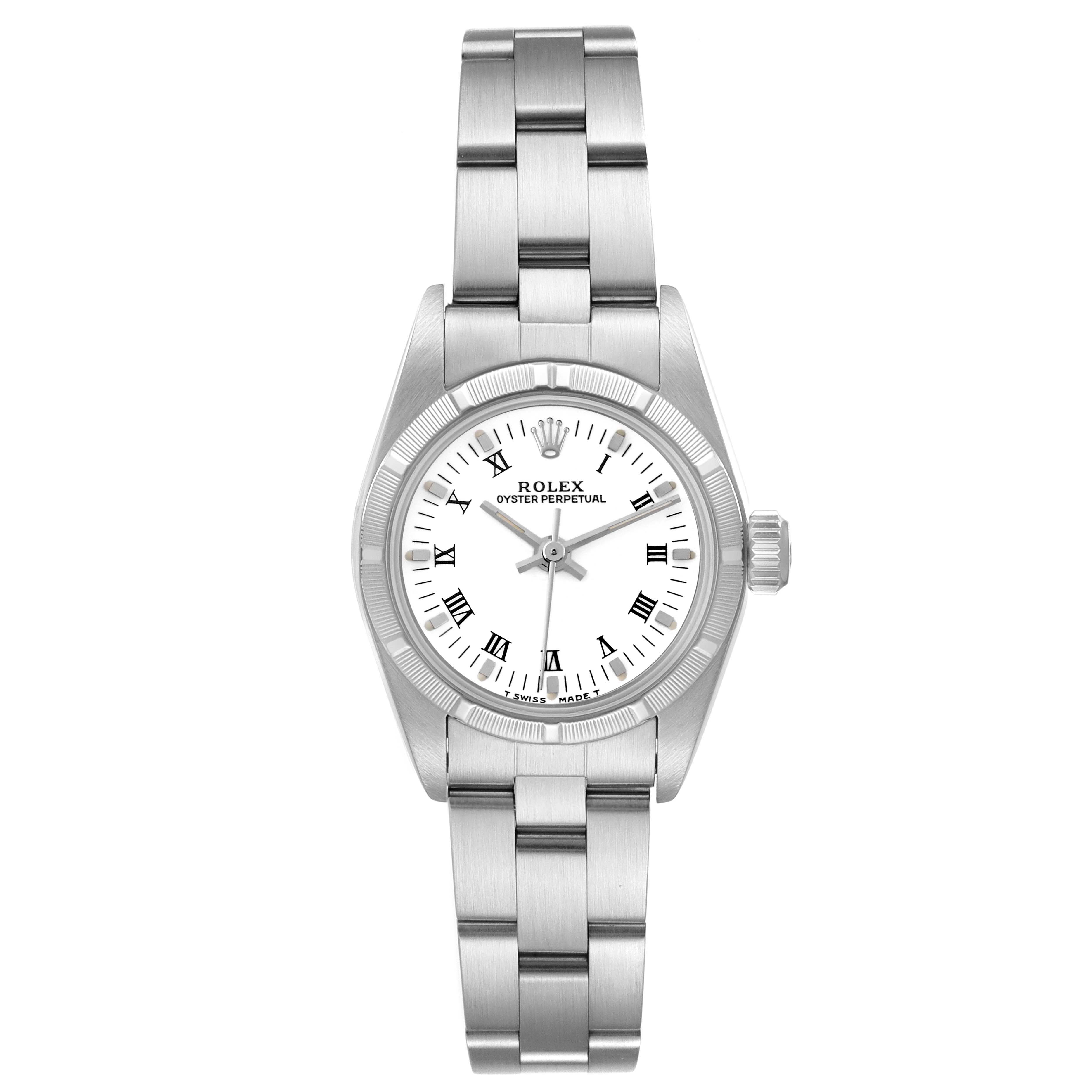 This Rolex Oyster Perpetual 67230 Women's Stainless Steel White Dial 67230 Women's Stainless Steel White Dial watch is shown from a top-down angle, displaying the full face and bracelet.