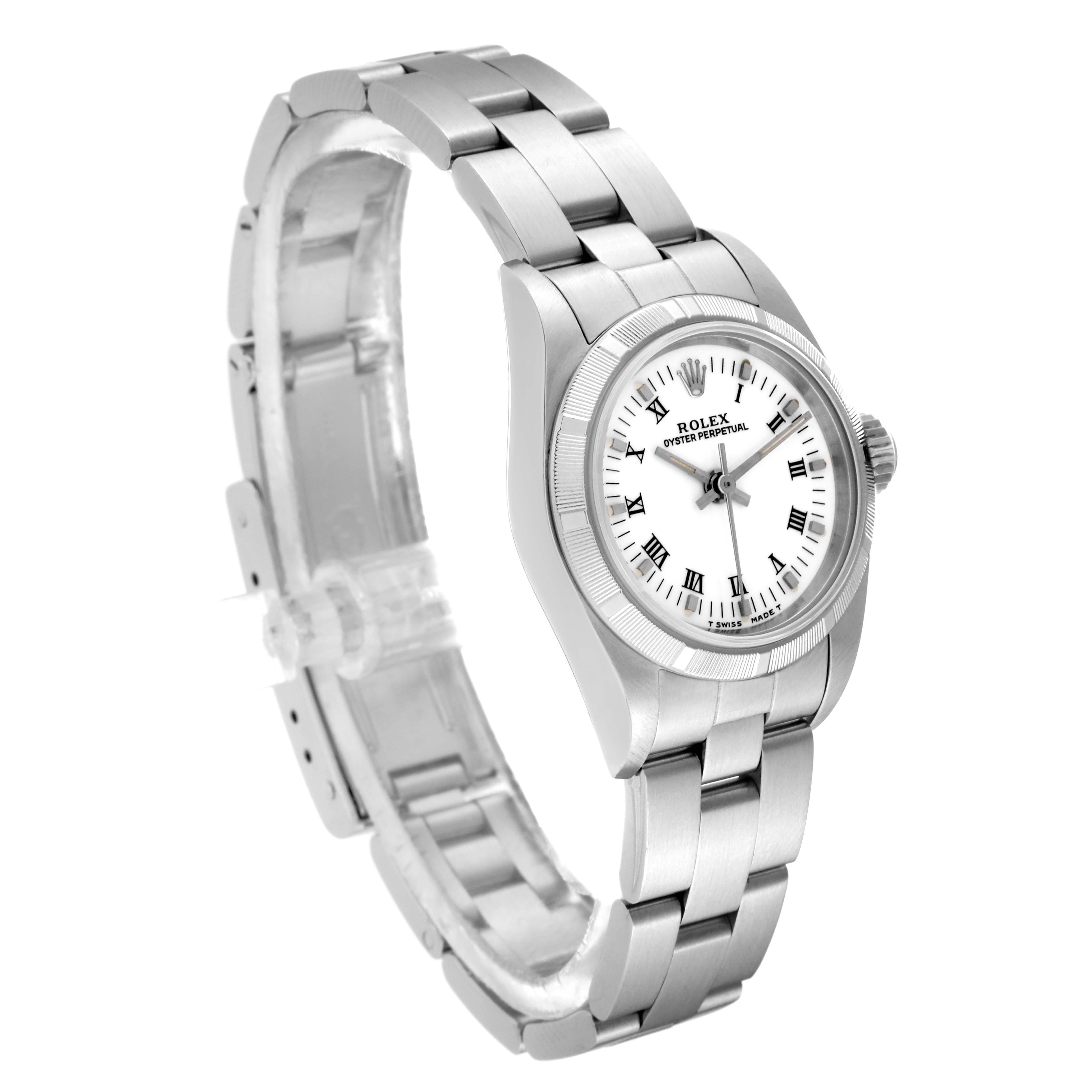 The Rolex Oyster Perpetual 67230 Women's Stainless Steel White Dial 67230 Women's Stainless Steel White Dial watch is shown at a slight angle, displaying the face, bezel, and part of the metal band.