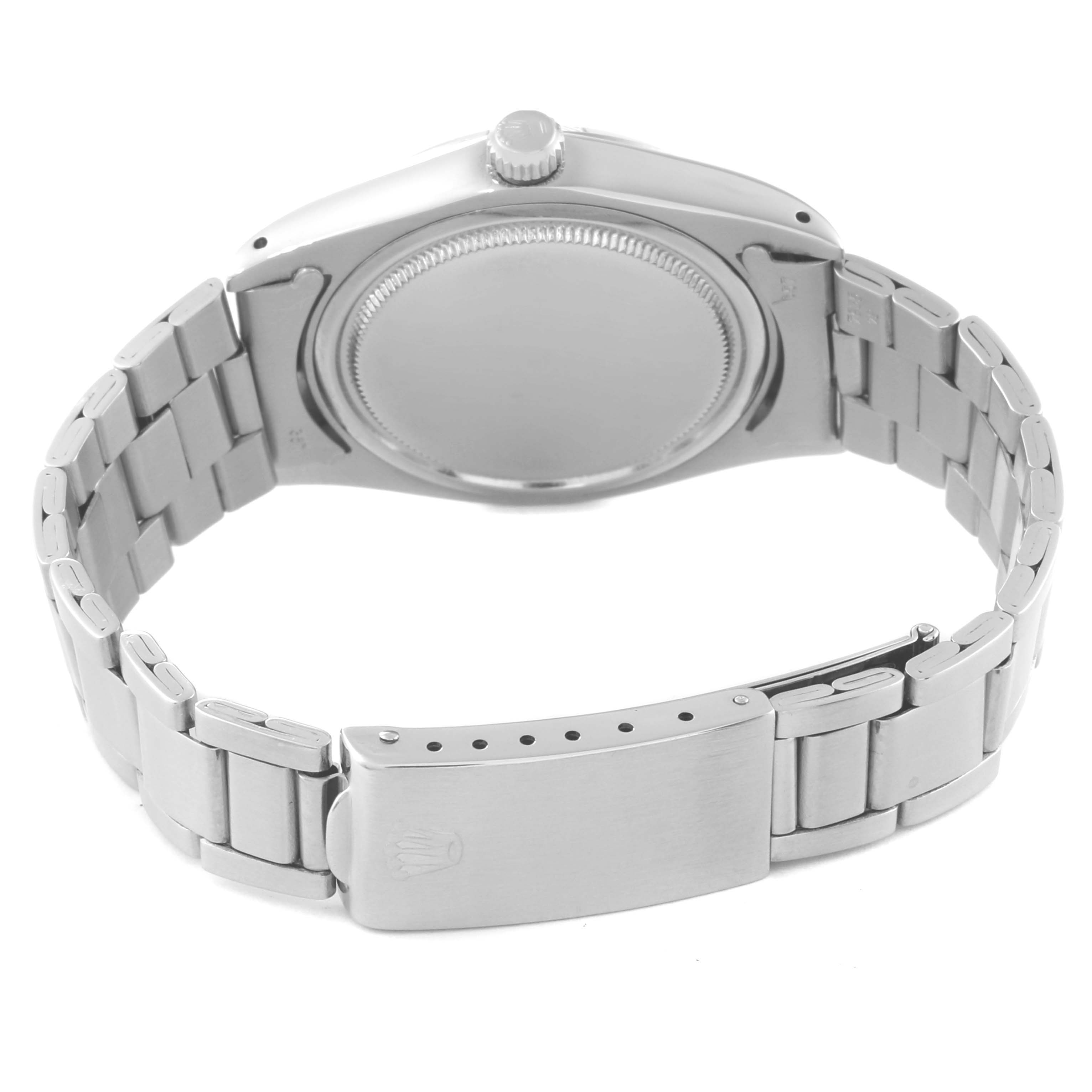 The image shows the back case and metal bracelet of a Rolex Vintage Collection 6694 Men's Stainless Steel Silver Dial 6694 Men's Stainless Steel Silver Dial model.