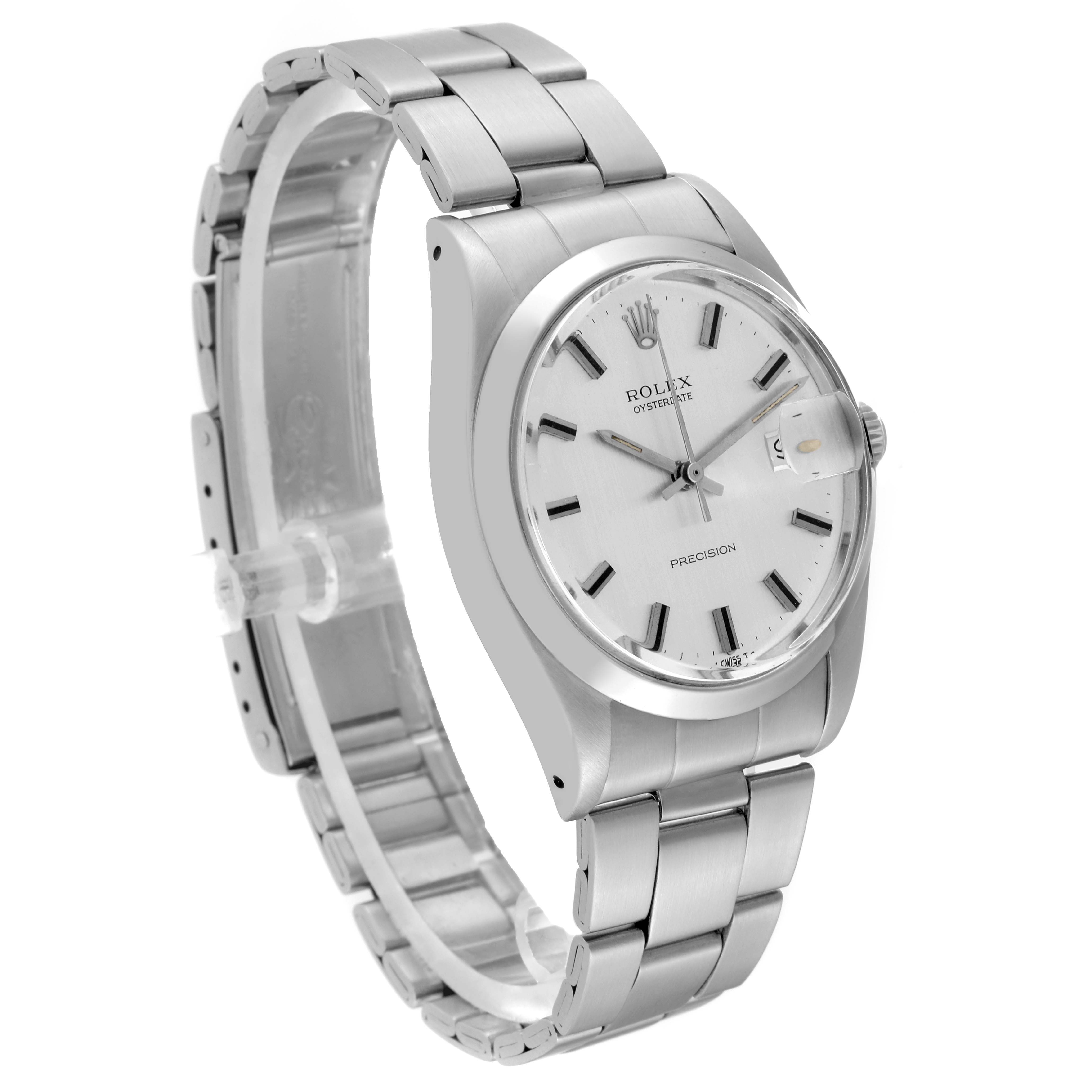 The image shows a side angle of a Rolex Vintage Collection 6694 Men's Stainless Steel Silver Dial 6694 Men's Stainless Steel Silver Dial watch, highlighting the dial, bezel, and metal strap.