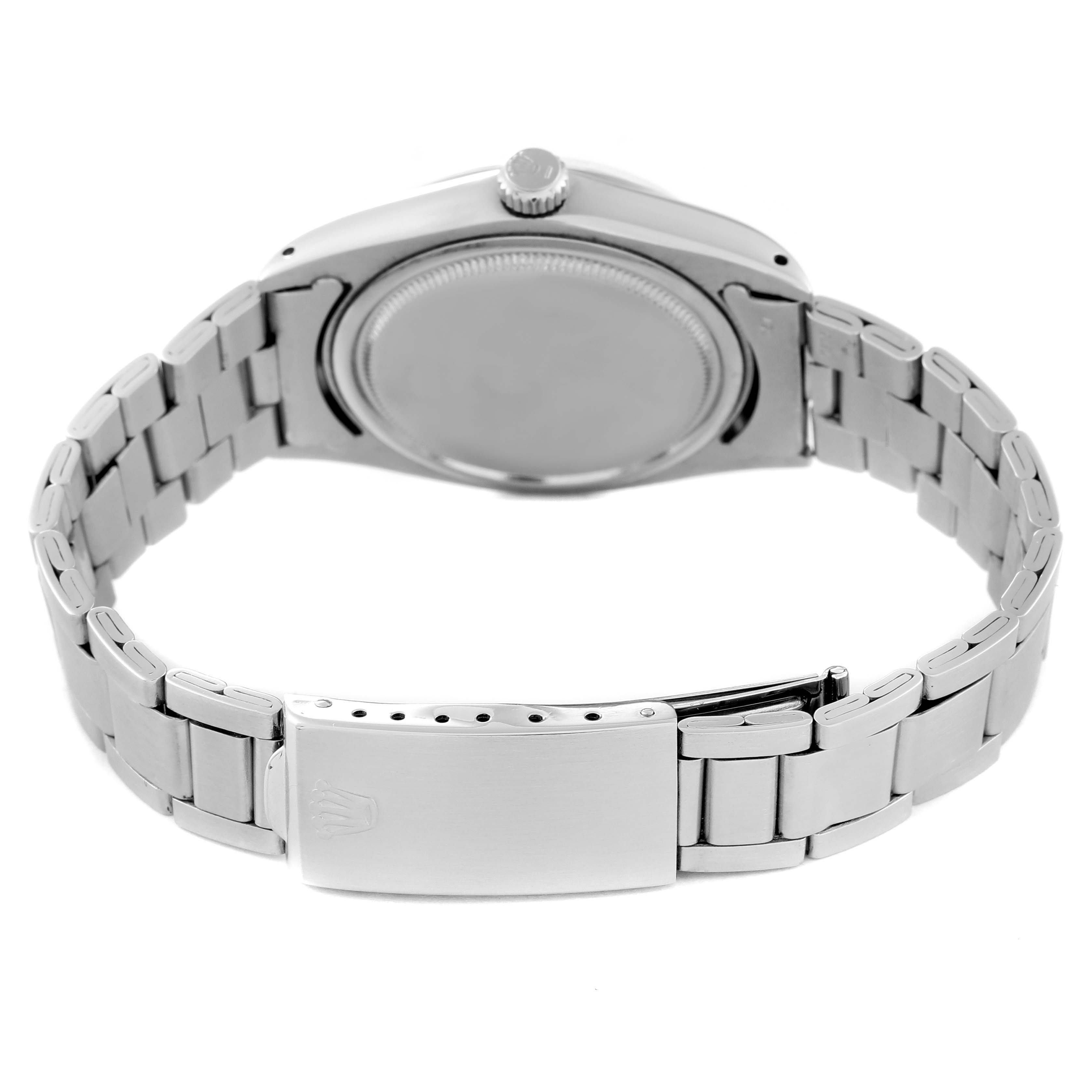 This image shows the back view of a Rolex Vintage Collection 6694 Men's Stainless Steel Silver Dial 6694 Men's Stainless Steel Silver Dial watch, highlighting its stainless steel case, bracelet, and clasp.