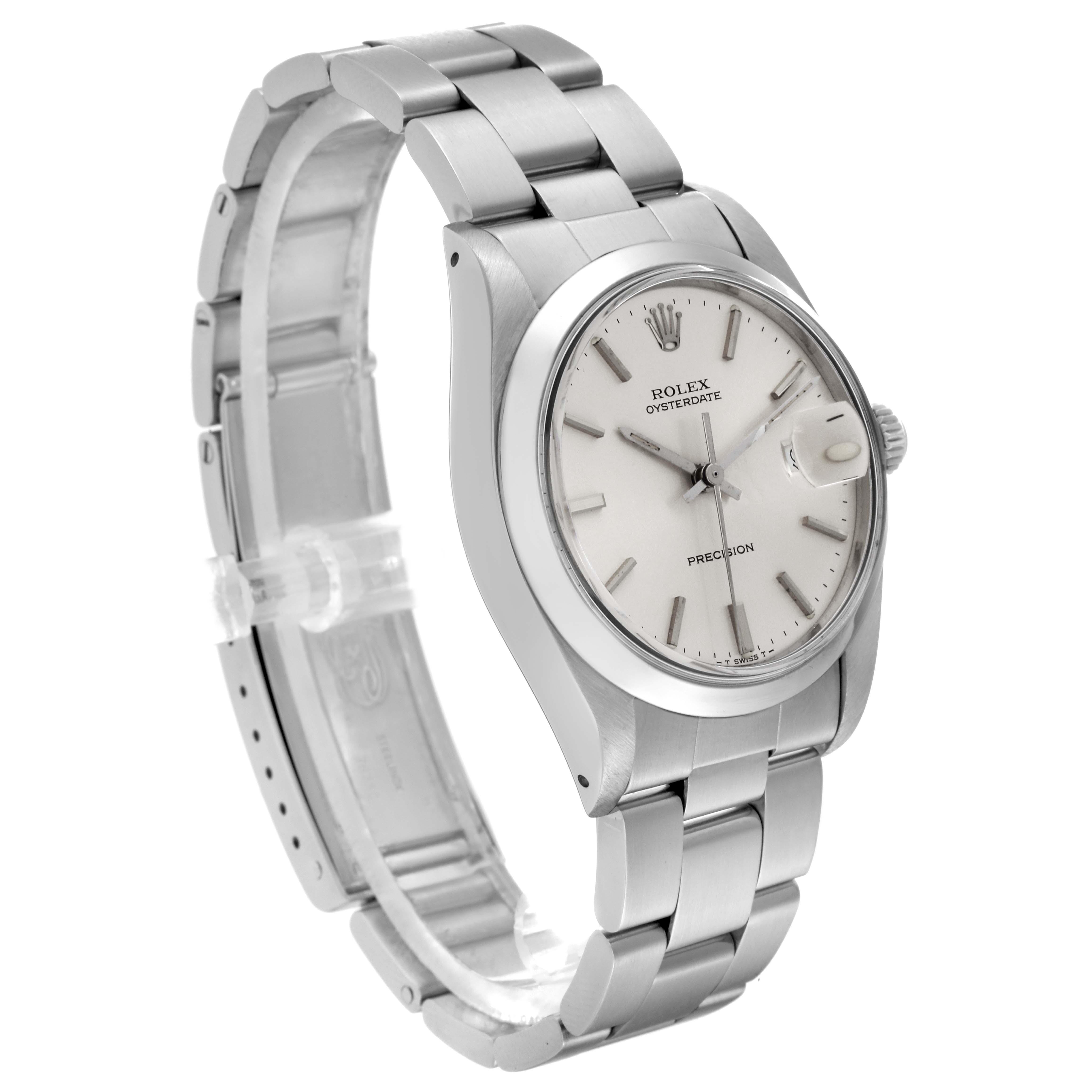 The Vintage Collection Rolex watch is shown at a slight angle, highlighting its face, bracelet, and clasp.