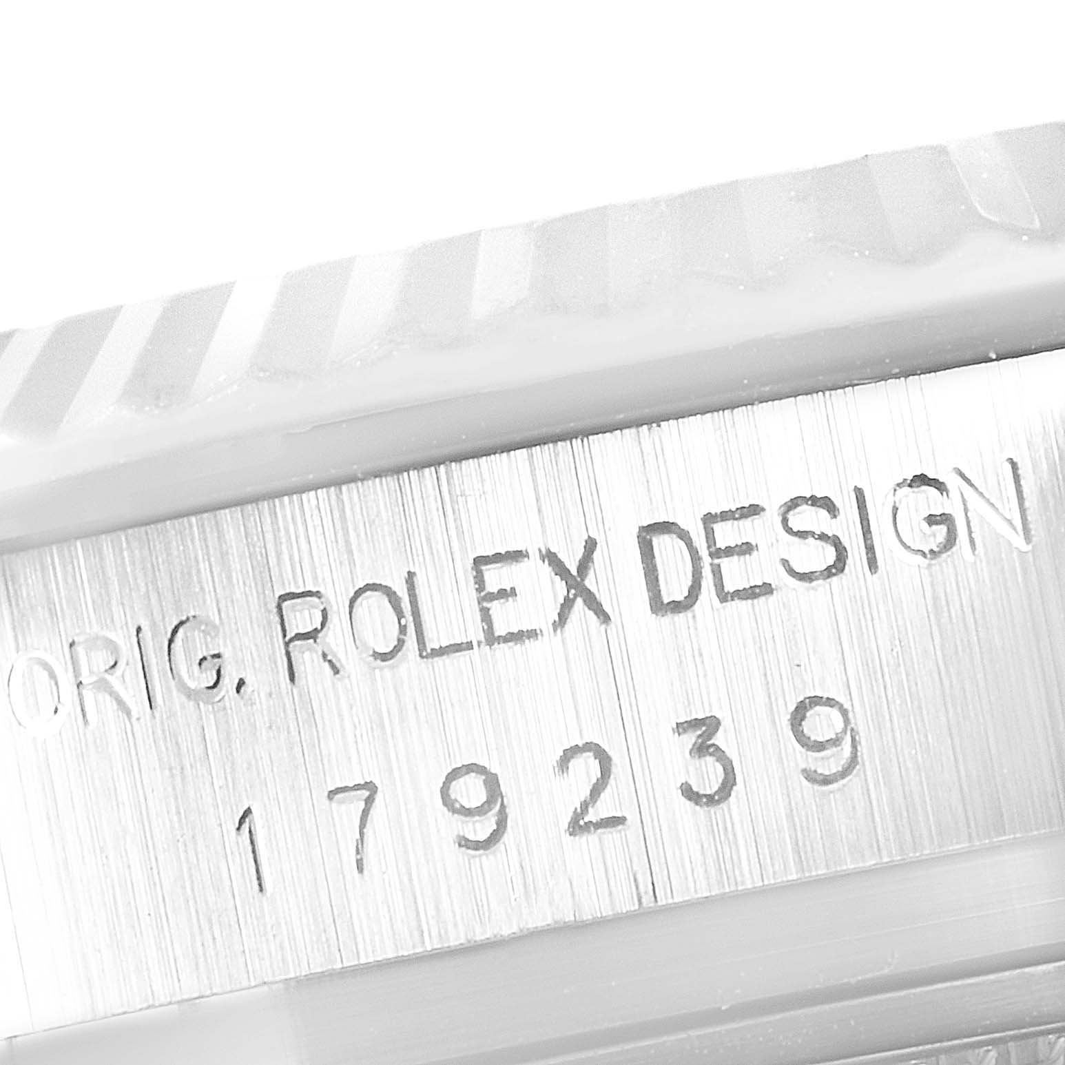 This image shows a close-up of the side of the President model Rolex watch, featuring the serial number.