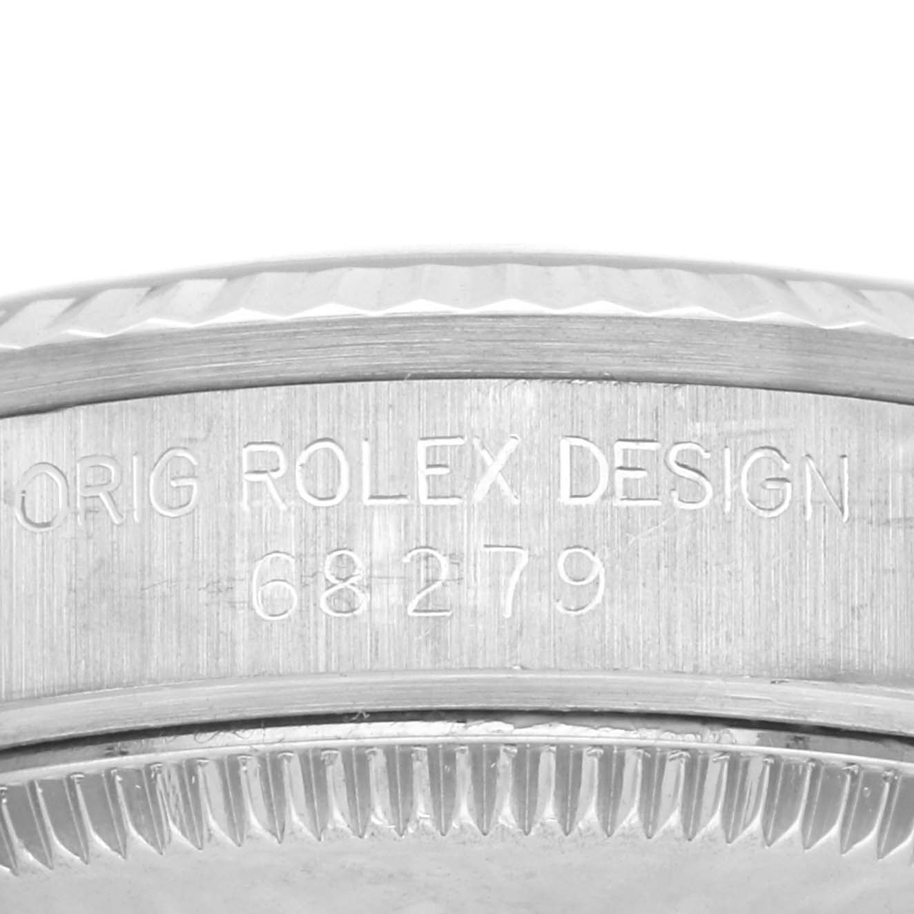 This image shows a close-up angle of the engraved side of a Rolex President 68279 Women's White Gold Black Dial 68279 Women's White Gold Black Dial model watch case.