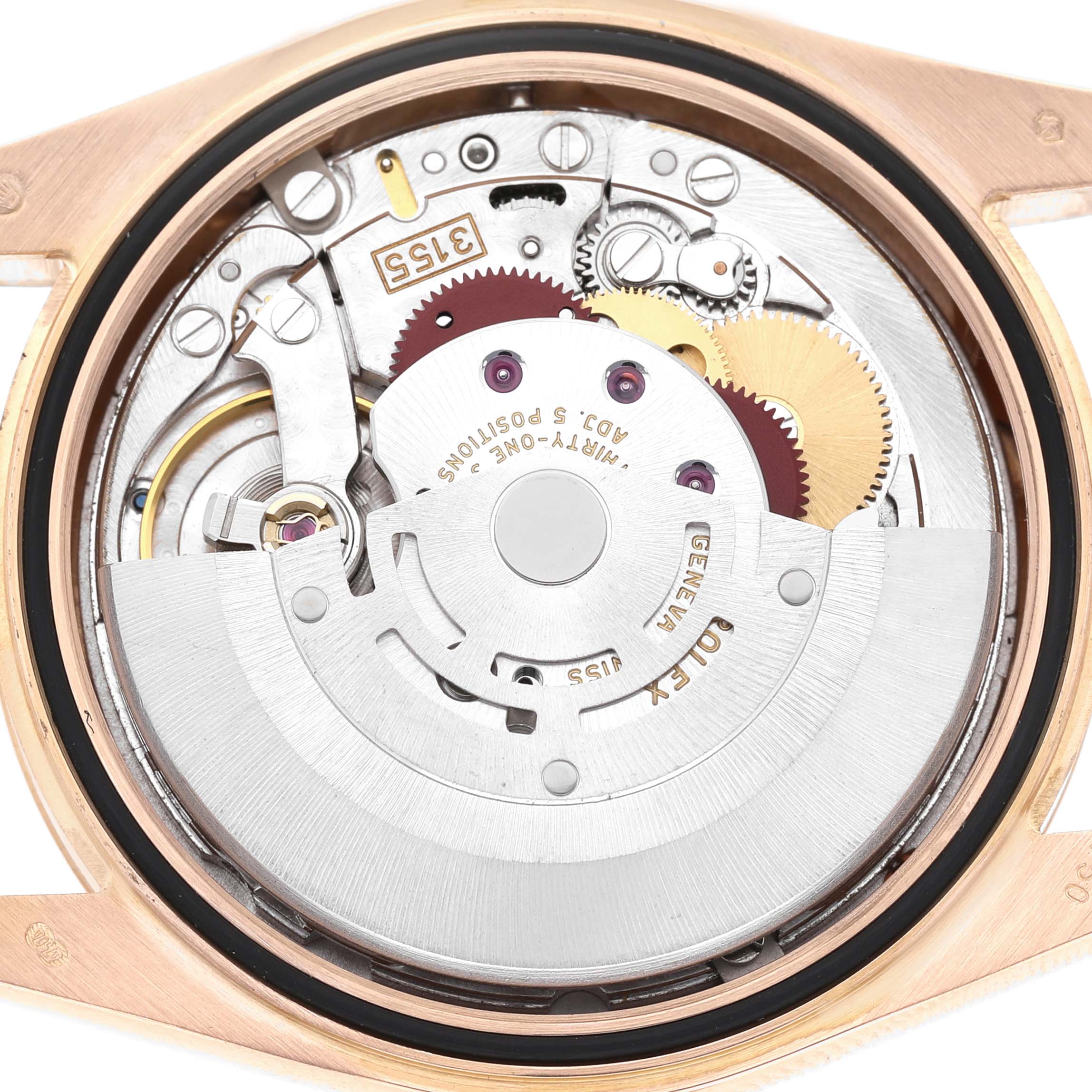 The image shows the intricate movement mechanism of a Rolex President 118235 Men's Rose Gold Pink Dial model watch from a direct overhead angle.