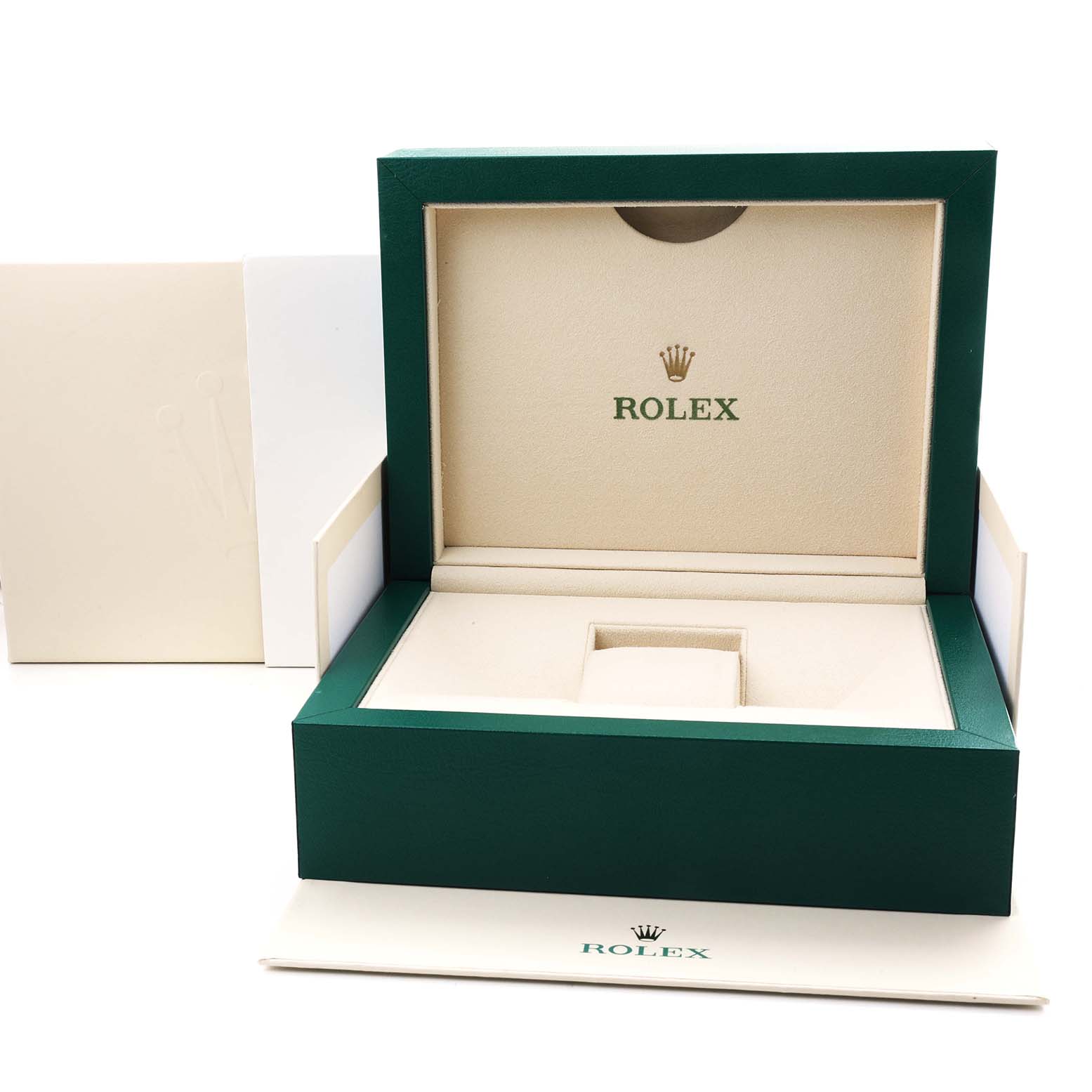 The image shows an open Rolex watch box for the President model, with the logo inside and an accompanying booklet.