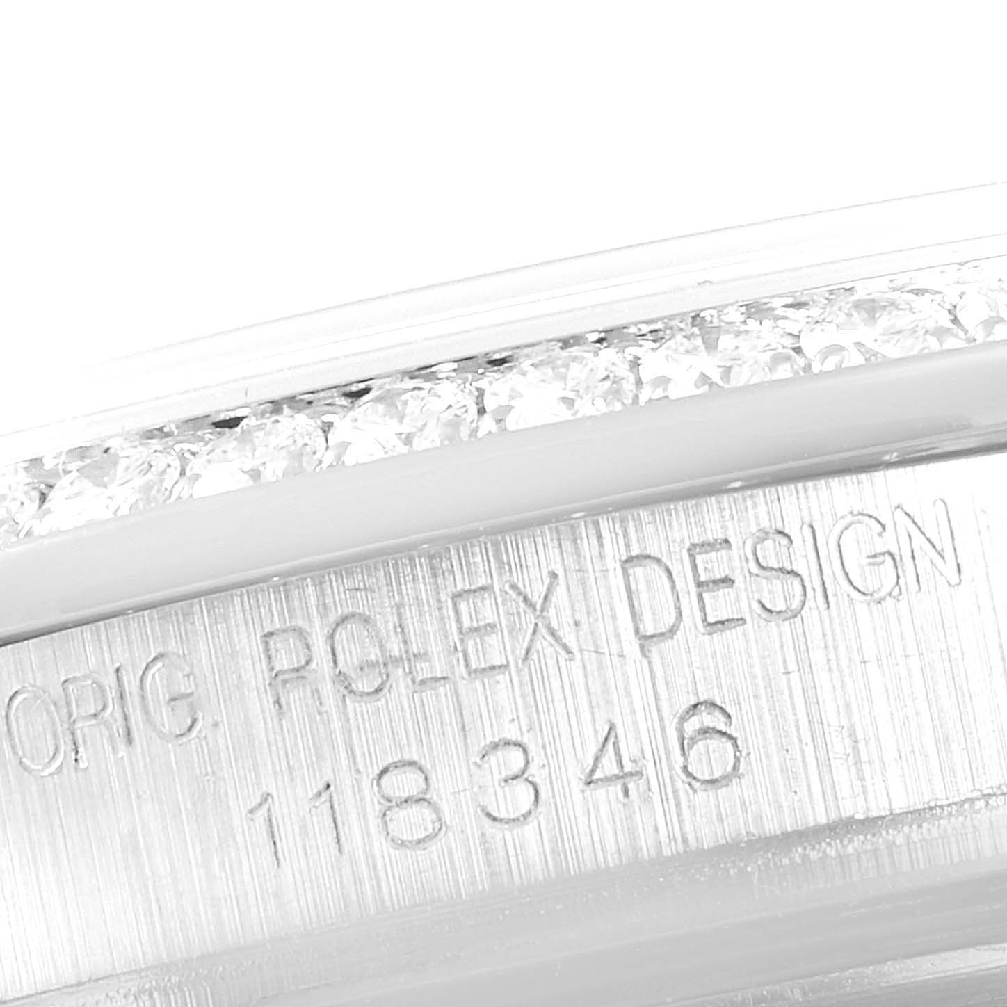 This close-up image shows the engraved bezel and diamond accents of a Rolex President 18346 Men's White Gold Silver Dial 18346 Men's White Gold Silver Dial model watch.