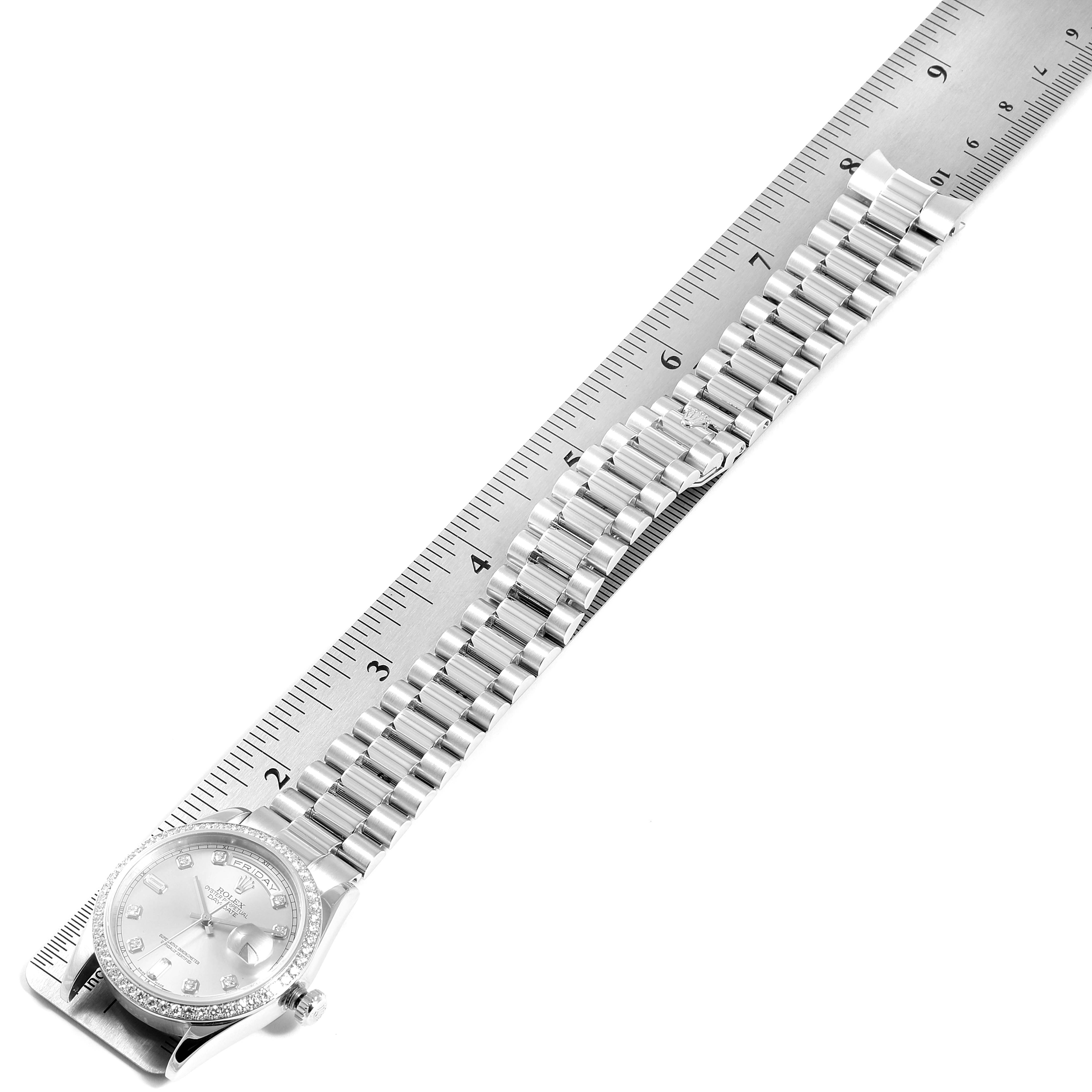 The image shows a full view of a Rolex President 18346 Men's White Gold Silver Dial 18346 Men's White Gold Silver Dial model watch, including the face, band, and a ruler for scale.