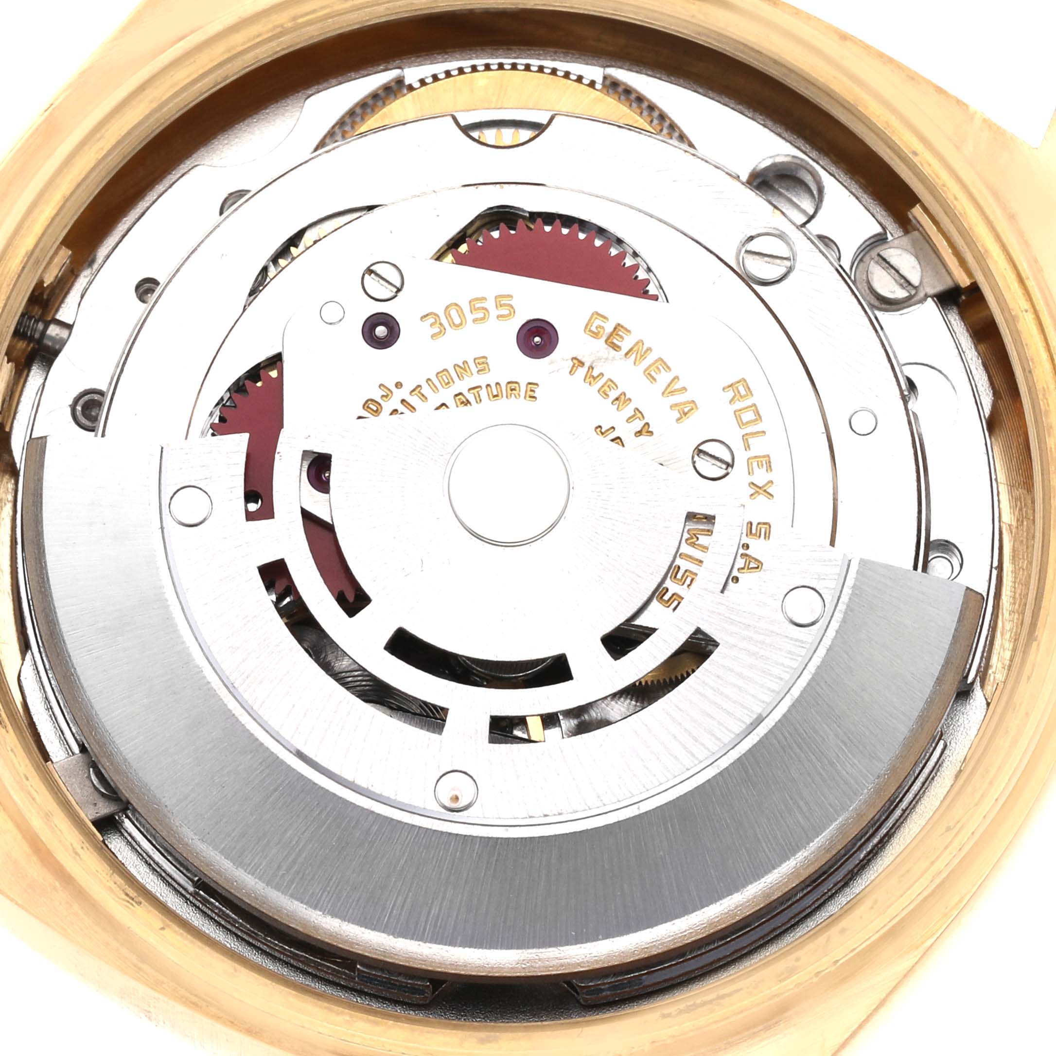 This is a close-up view of the movement of a Rolex President 18038 Men's Yellow Gold Black Dial 18038 Men's Yellow Gold Black Dial model, showing its intricate internal mechanisms and components.