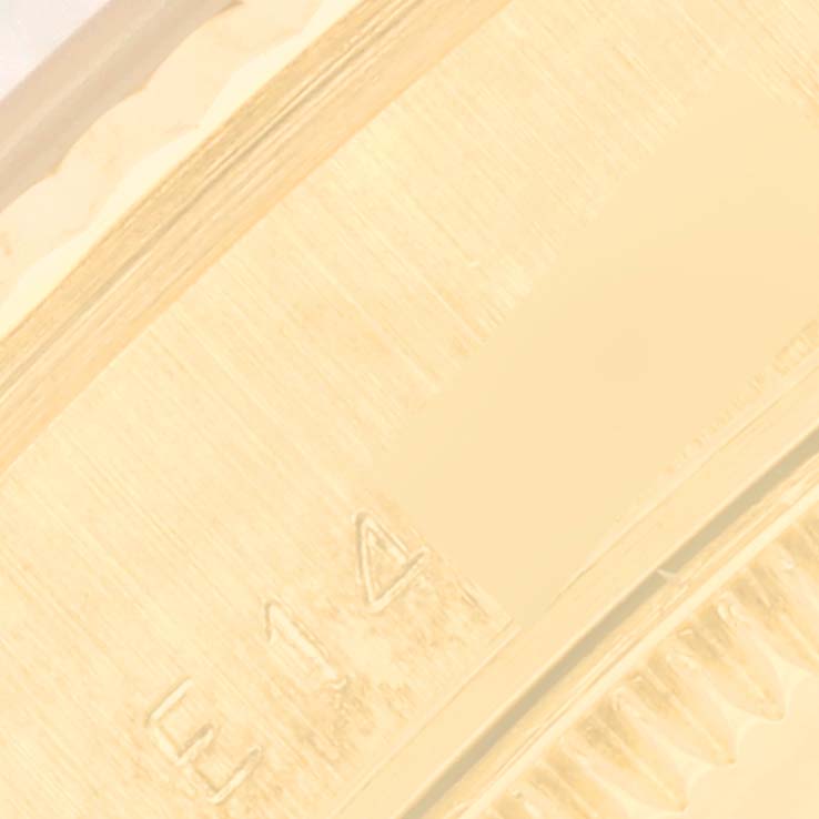 This close-up image shows the engraved case back of a Rolex President 68278G Women's Yellow Gold Champagne Dial 68278G Women's Yellow Gold Champagne Dial model watch.