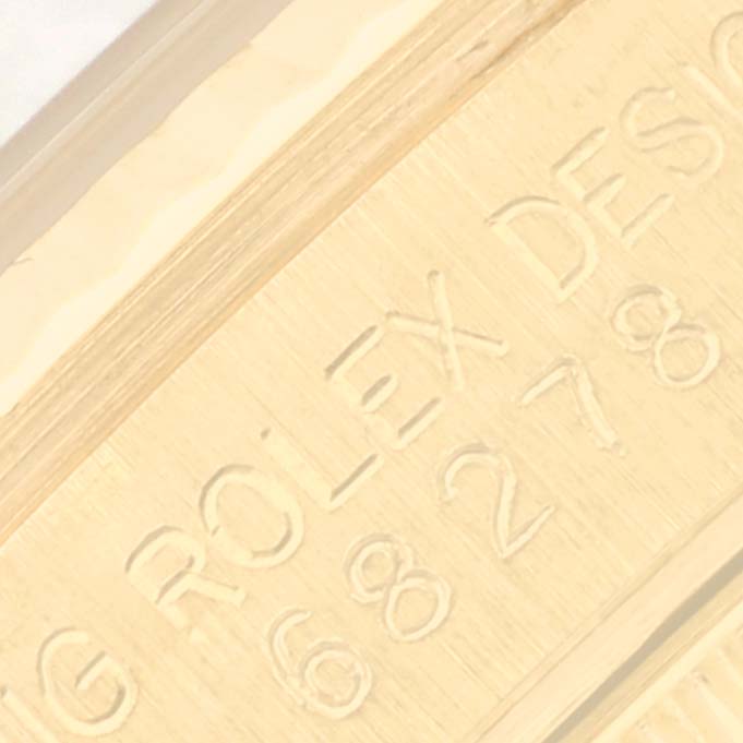 The image shows a close-up view of the engraved backside of a Rolex President 68278G Women's Yellow Gold Champagne Dial 68278G Women's Yellow Gold Champagne Dial model watch.