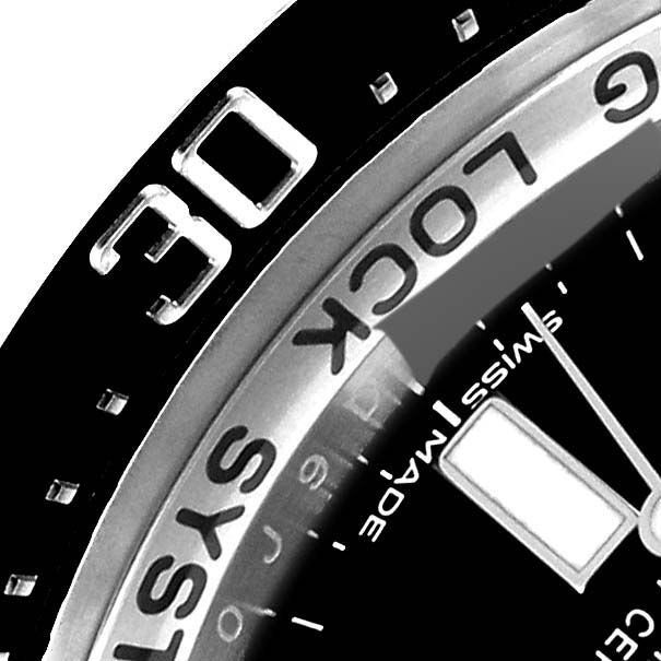 The image shows a close-up of the bezel, part of the dial, and the hands of a Rolex Sea-Dweller 116660 Men's Stainless Steel Blue Dial 116660 Men's Stainless Steel Blue Dial watch.