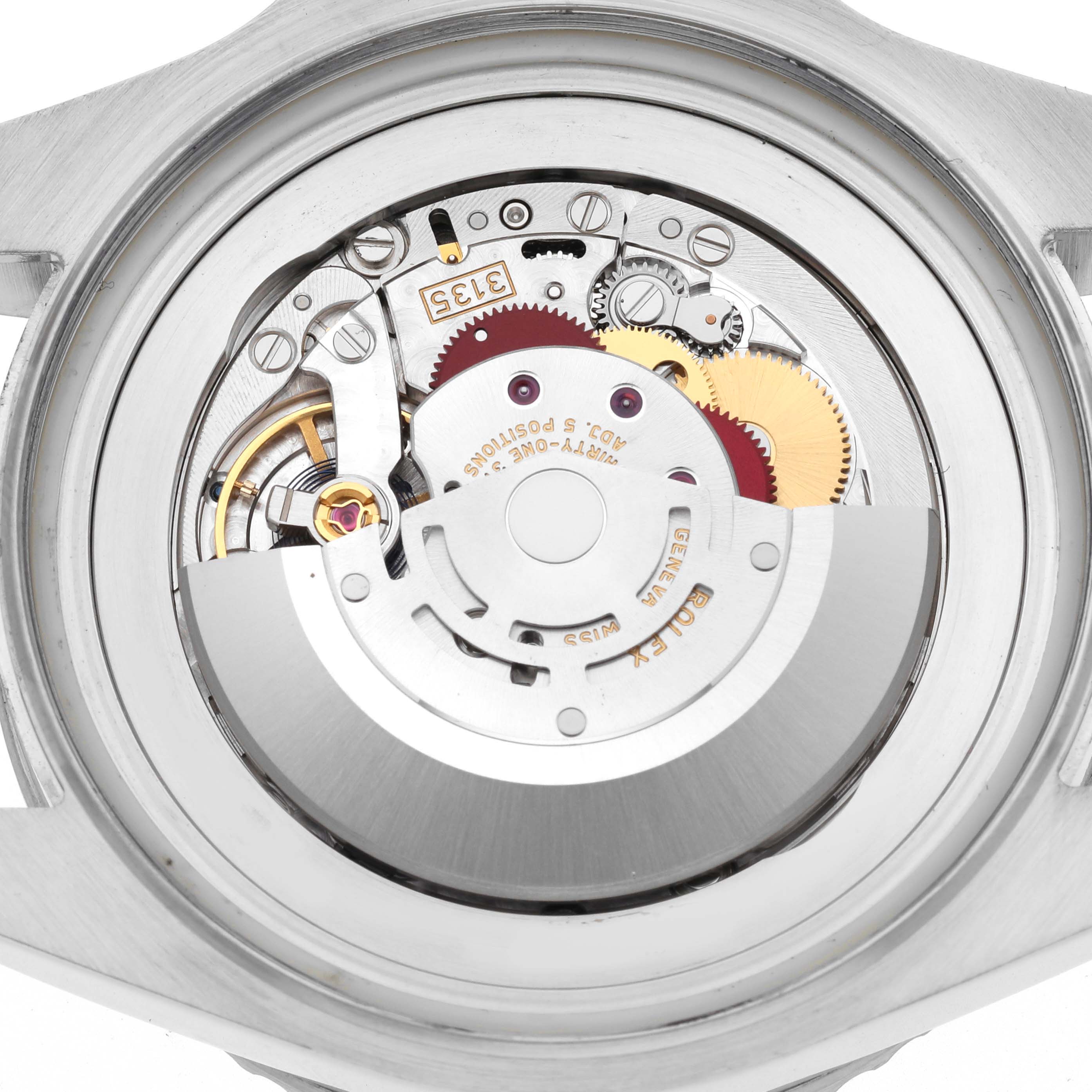 The image shows the movement and internal mechanism of a Rolex Sea-Dweller 116660 Men
s Stainless Steel Black Dial 116660 Men
s Stainless Steel Black Dial watch from a rear angle.