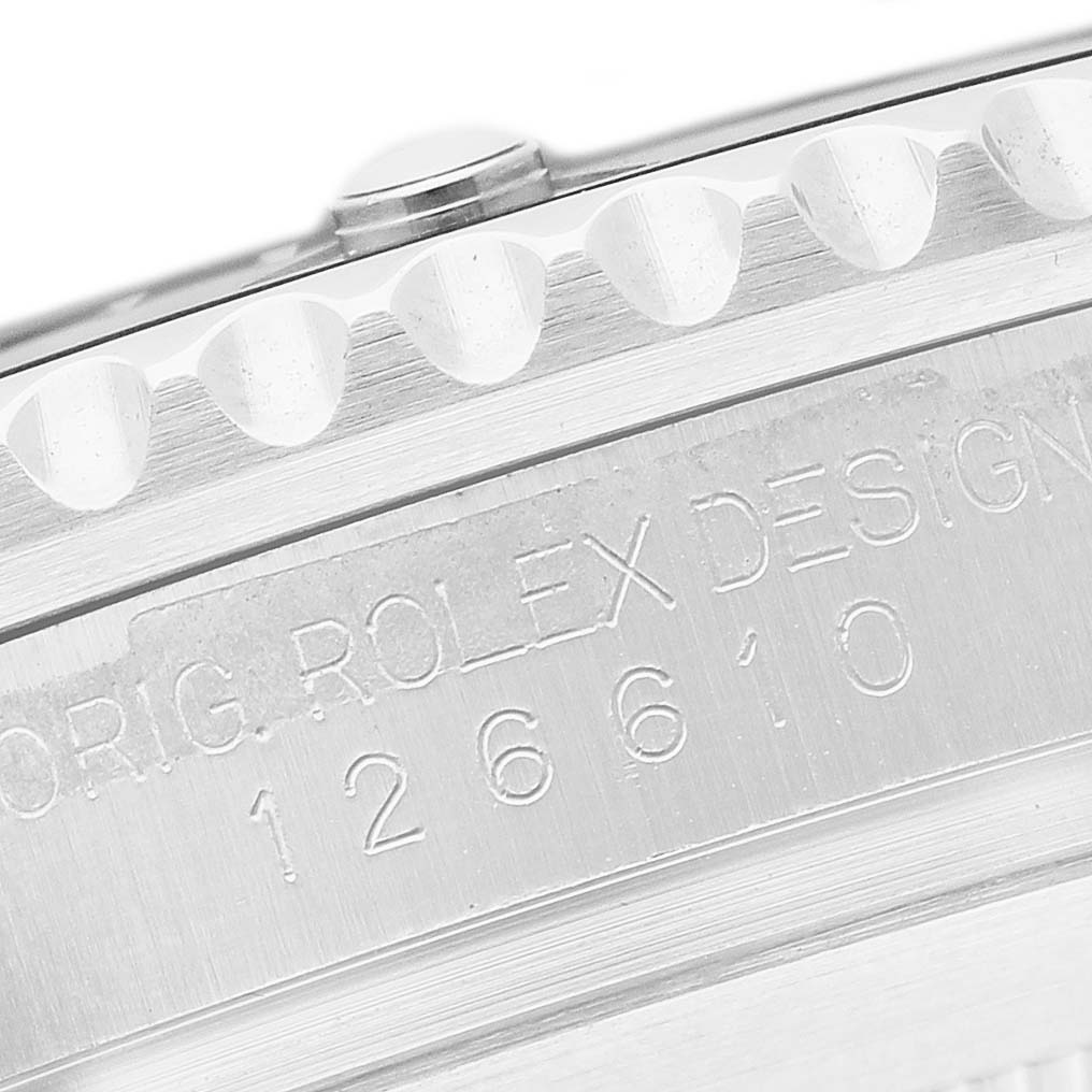 The image shows a close-up of the side of the Rolex Submariner 126610LN Men's Stainless Steel Black Dial, highlighting the engraved model number and bezel edge.