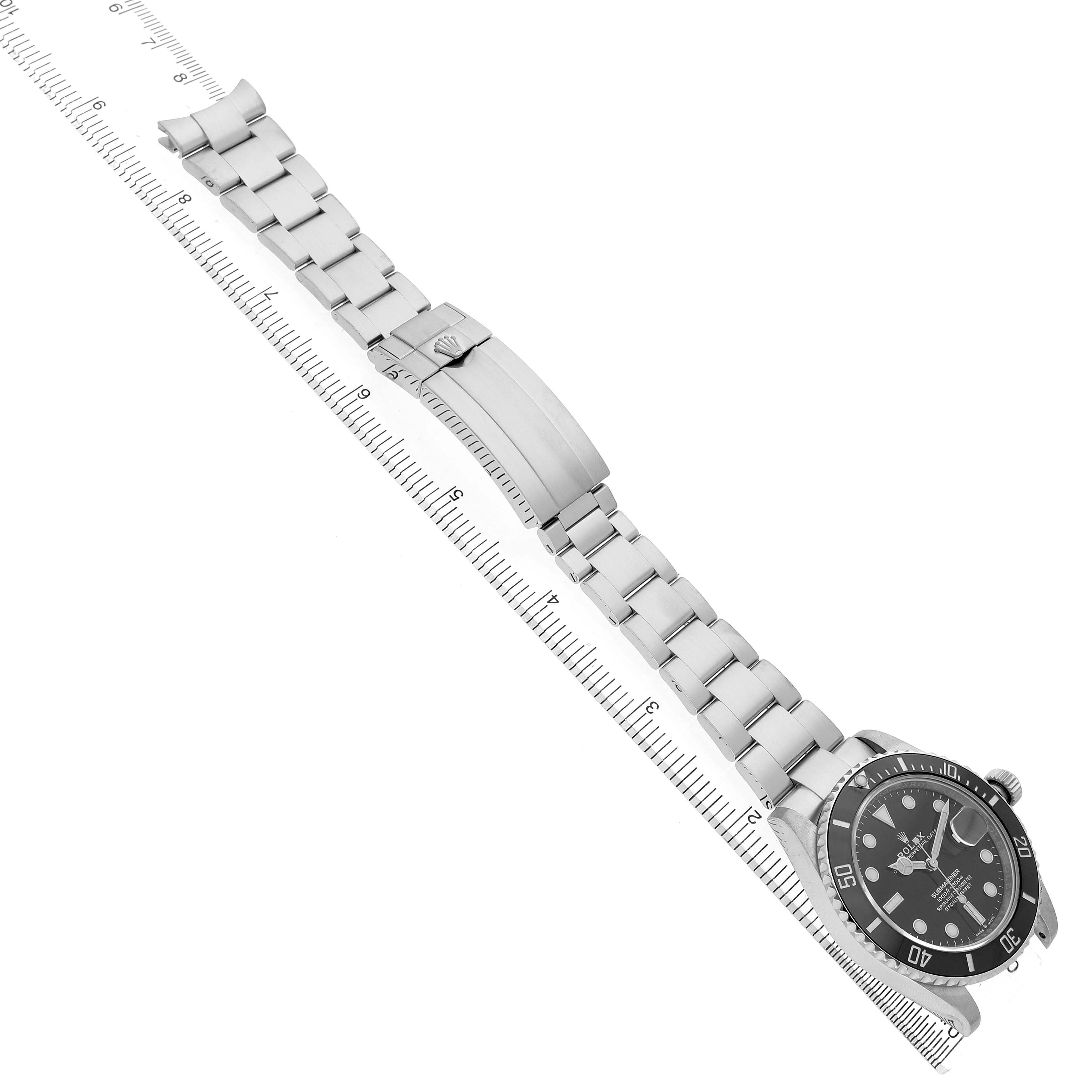 The Rolex Submariner 126610LN Men's Stainless Steel Black Dial watch is displayed diagonally, showing the full bracelet, clasp, and dial.