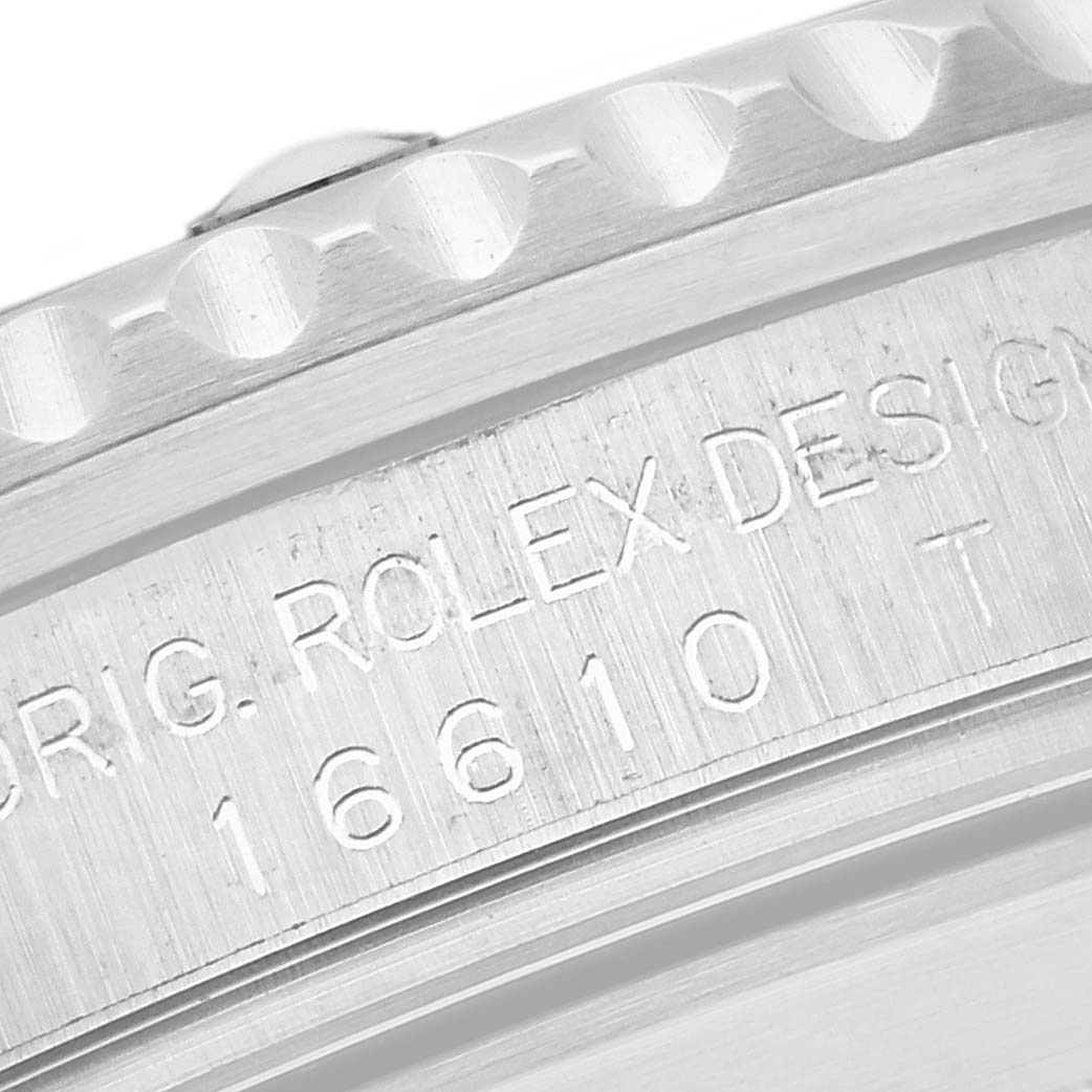 The image shows a close-up of the engraving on the case side of a Rolex Submariner 16610 Men's Stainless Steel Black Dial 16610 Men's Stainless Steel Black Dial, featuring the model number 16610.